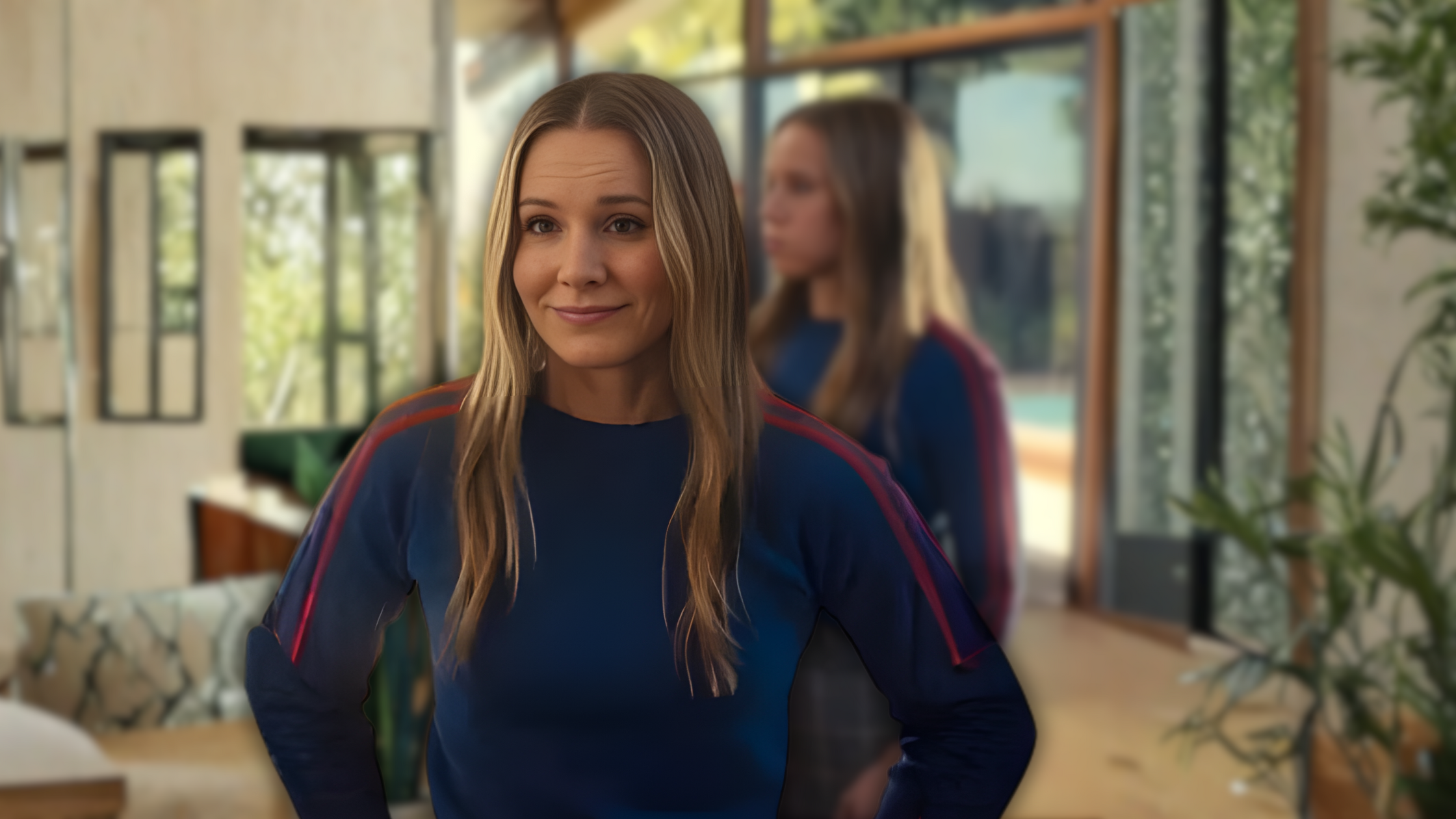 Kristen Bell wearing a red and orange striped blue sweater as Joanne in Nobody Wants This Season 2.