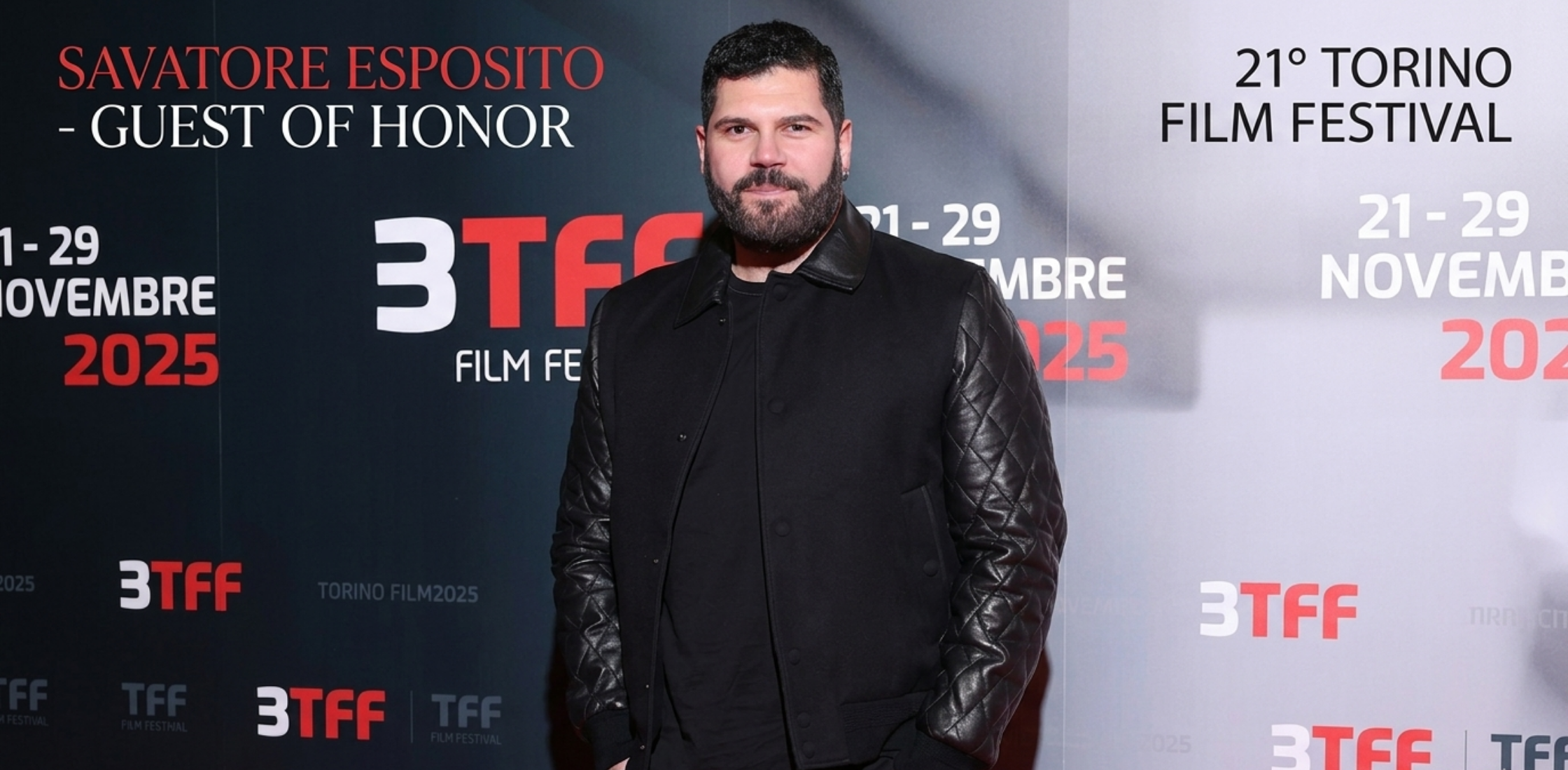 Salvatore Esposito Torino Film Festival 2025 black varsity jacket with leather sleeves