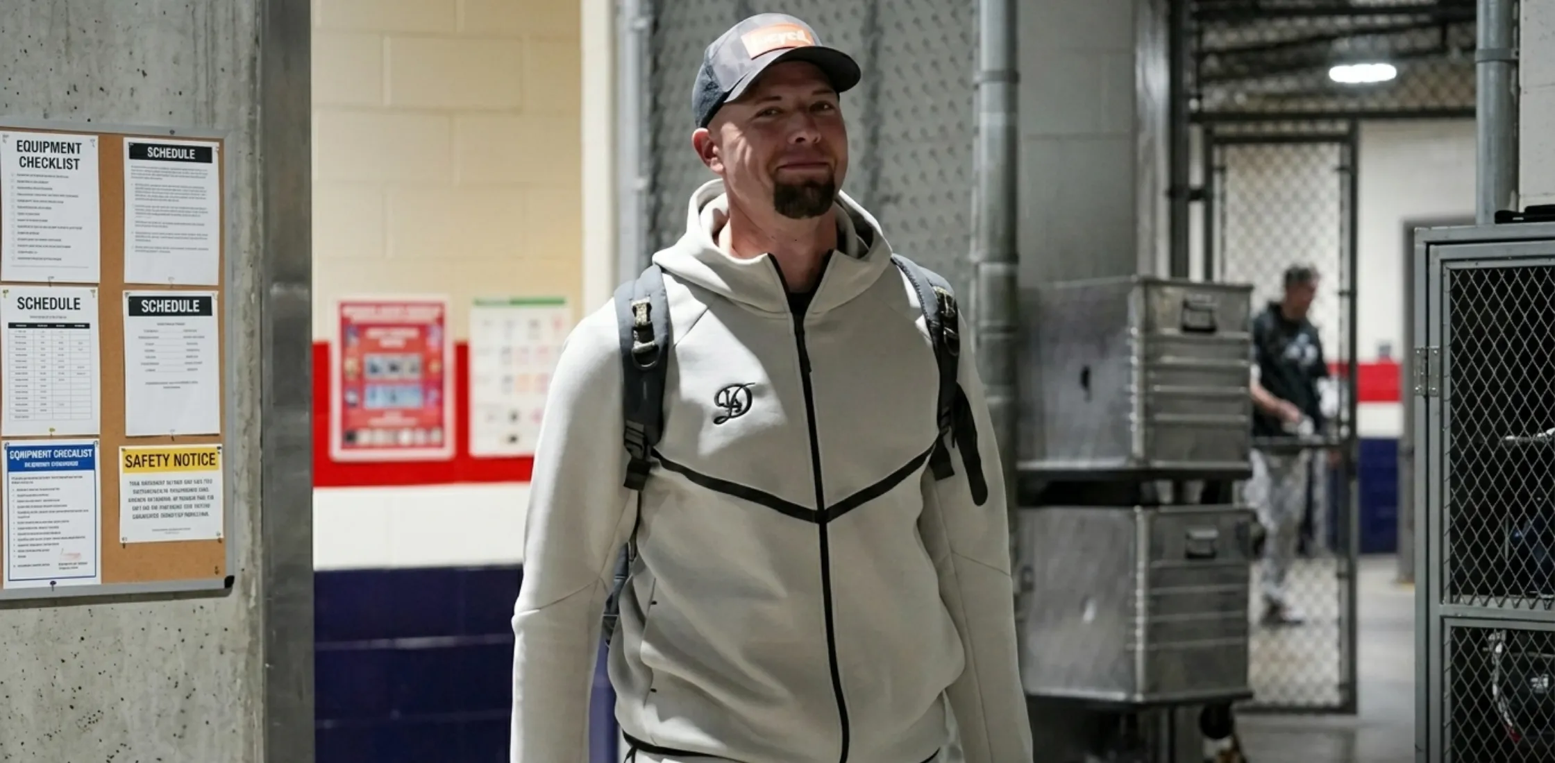 Los Angeles Dodgers 2026 tech fleece jacket in oatmeal grey with black accents, featuring “D” logo, zippered bicep pocket, and scuba-style hood.