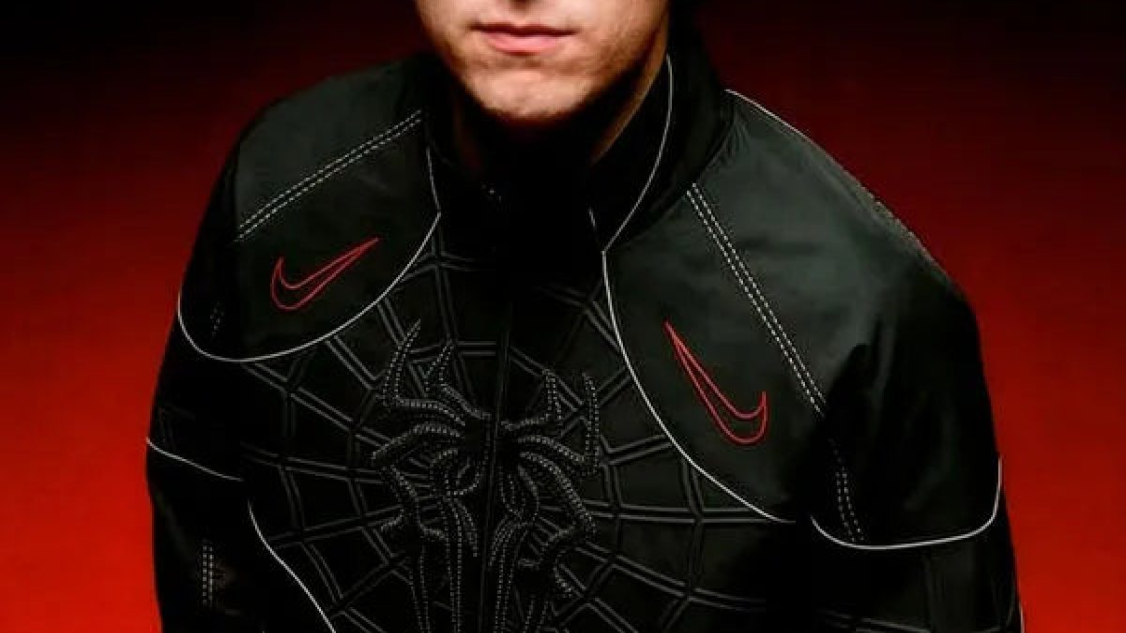 Spider-Man BND 2026 Tom Holland black track jacket with 3D spider emblem and web stitch detailing