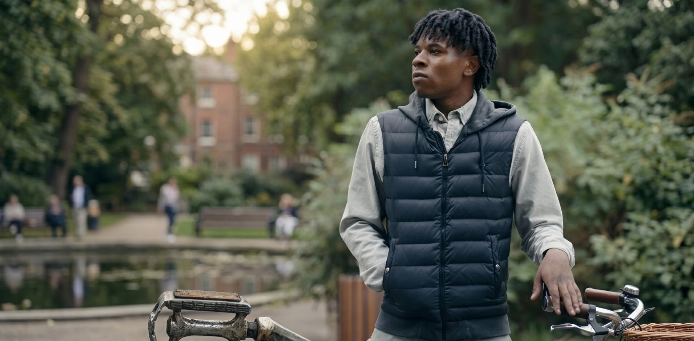 Patrick Burrowes Criminal Record Black Vest with hood, quilted puffer design, matte black finish, and modern slim-fit streetwear style