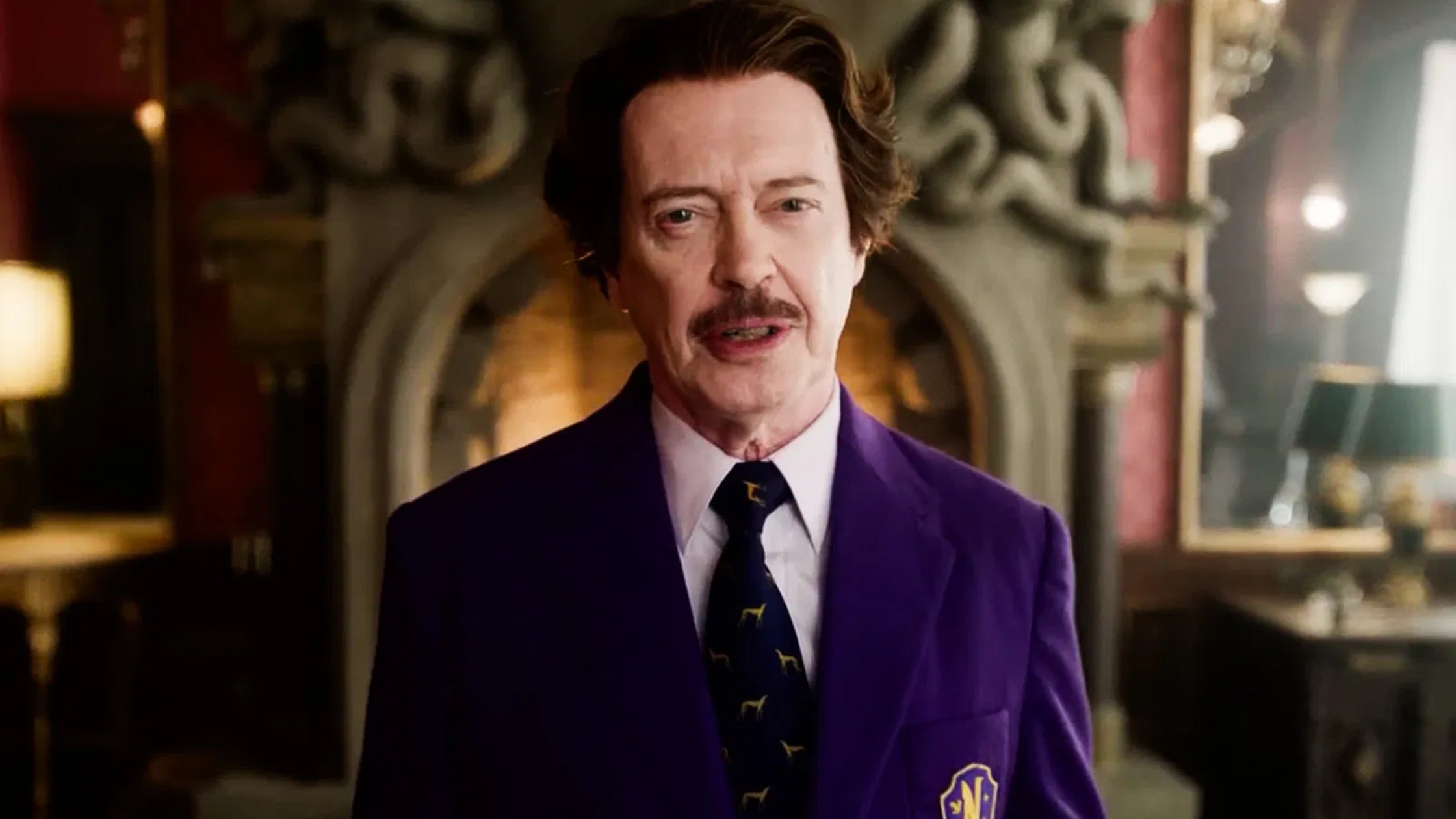 Wednesday S02 Barry Dort purple uniform blazer with circular patch, notched lapels, and tailored gothic academic design