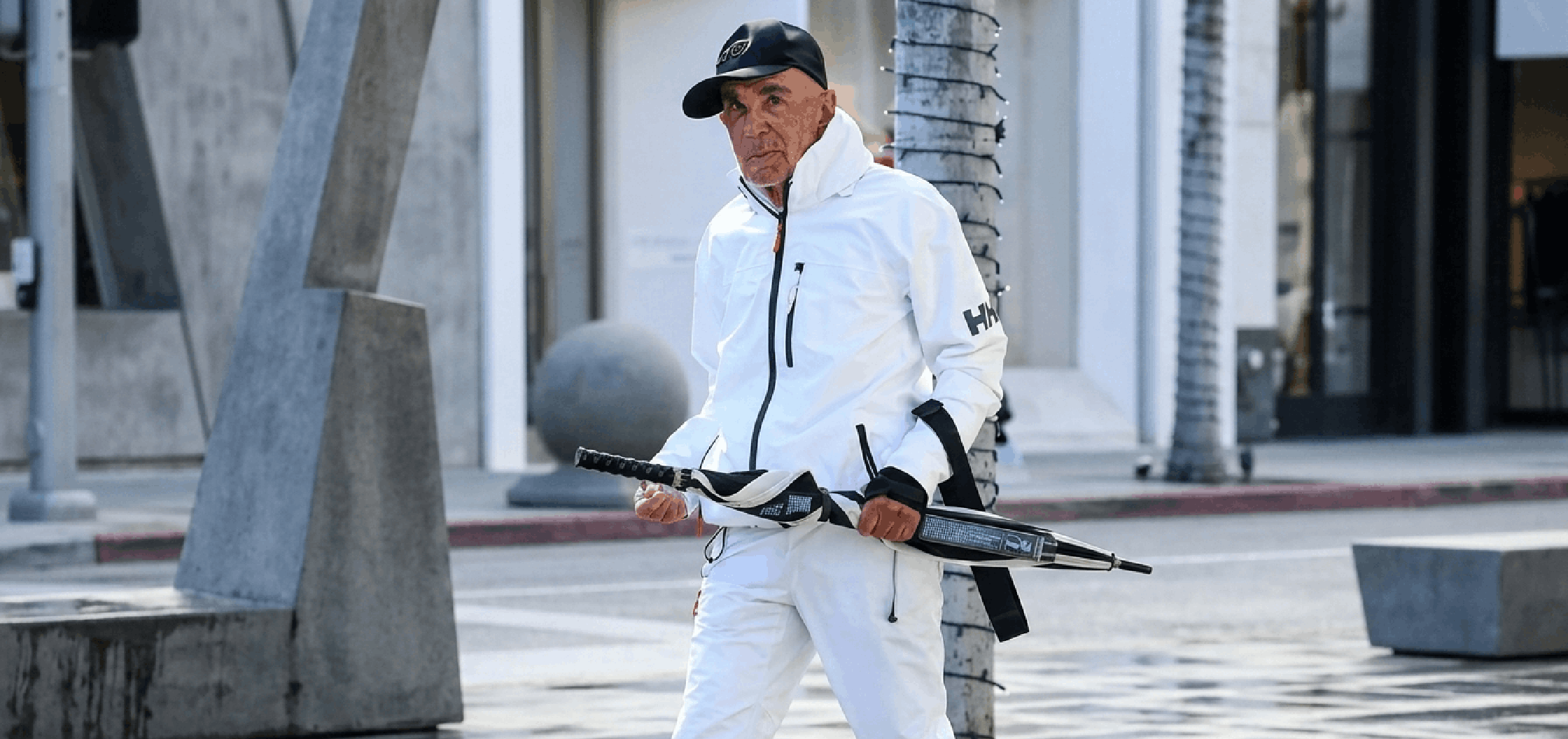 White technical windbreaker hooded jacket with black seam piping, full zip closure, chest pocket, and minimalist athletic fit inspired by LA 2026 streetwear style.