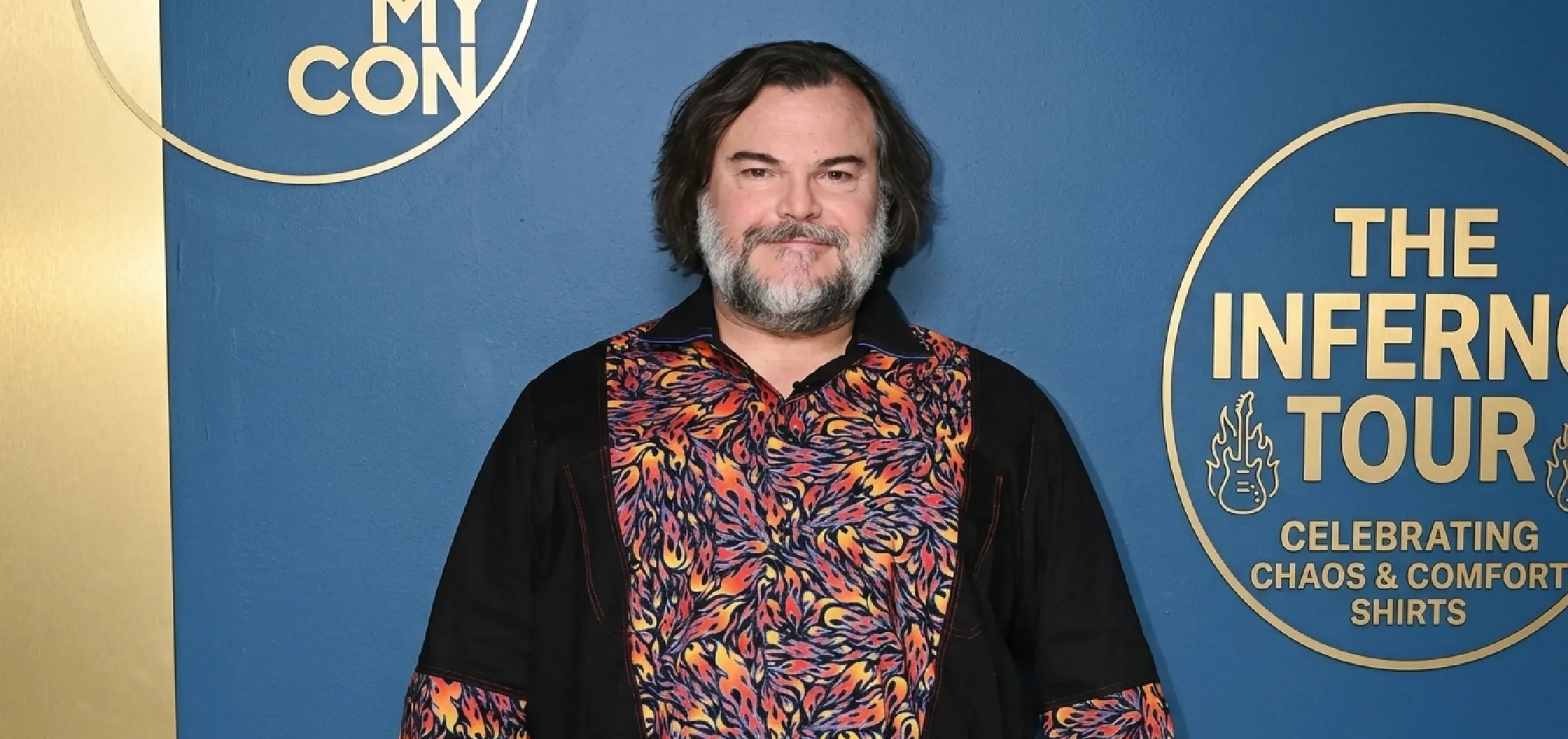 Jack Black black retro flame paneled button-down shirt on The Tonight Show with bold red orange flame design and camp collar