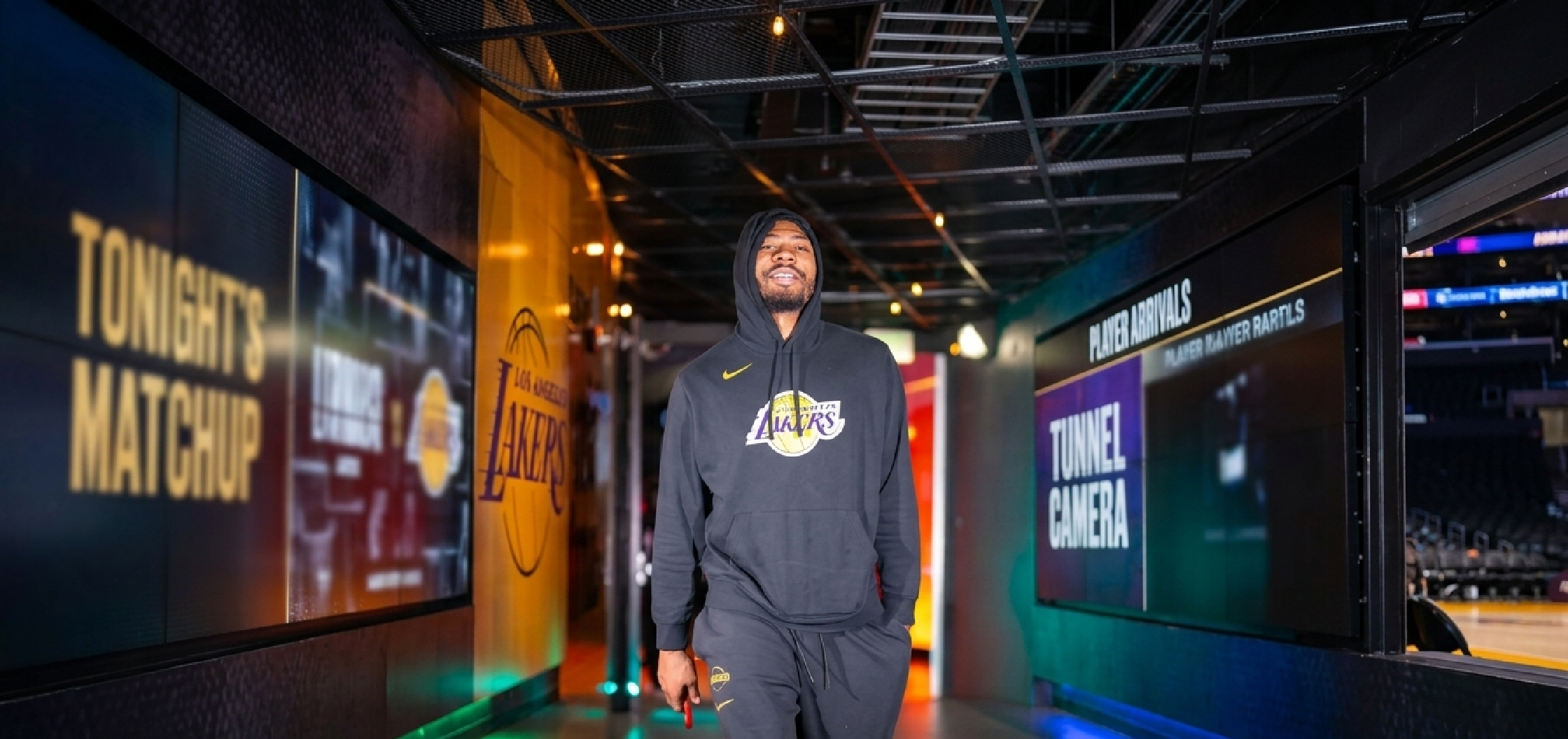 Marcus Smart Lakers vs Rockets black Nike hoodie with gold swoosh and Lakers logo courtside 2025