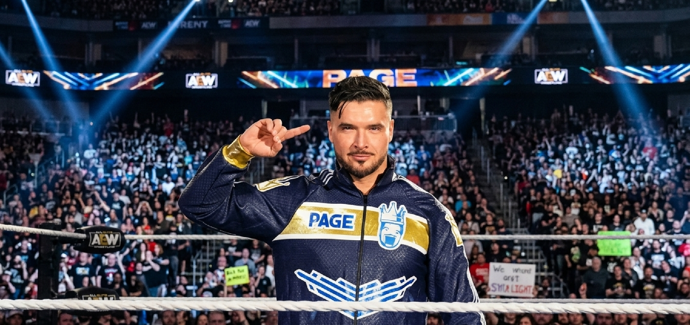 Ethan Page Monday Night RAW 2026 All Ego navy blue gold track jacket with triple stripe sleeves and WWE inspired design