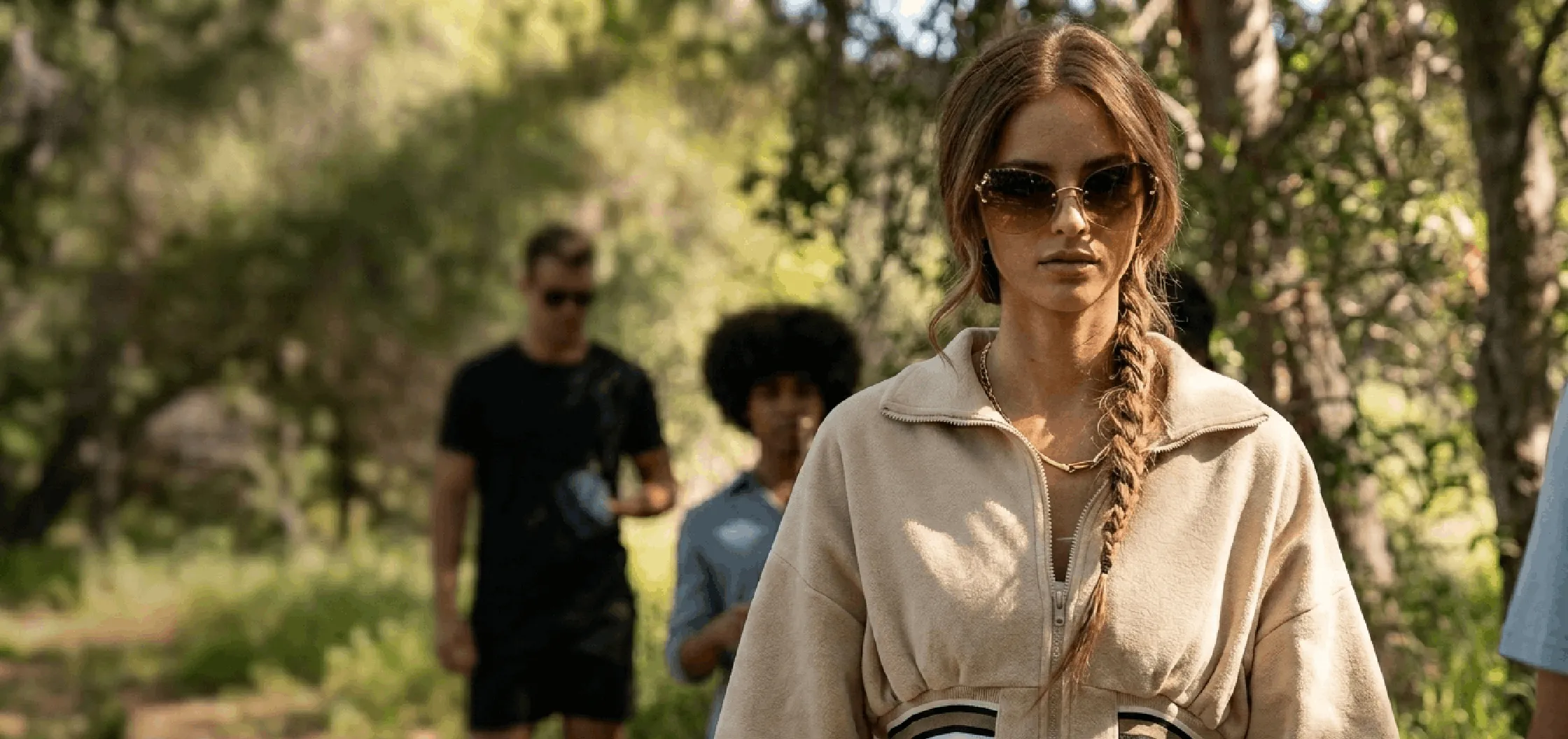 Jessica Chandler beige cropped bomber jacket from Nine Perfect Strangers with oversized sleeves and ribbed waistband