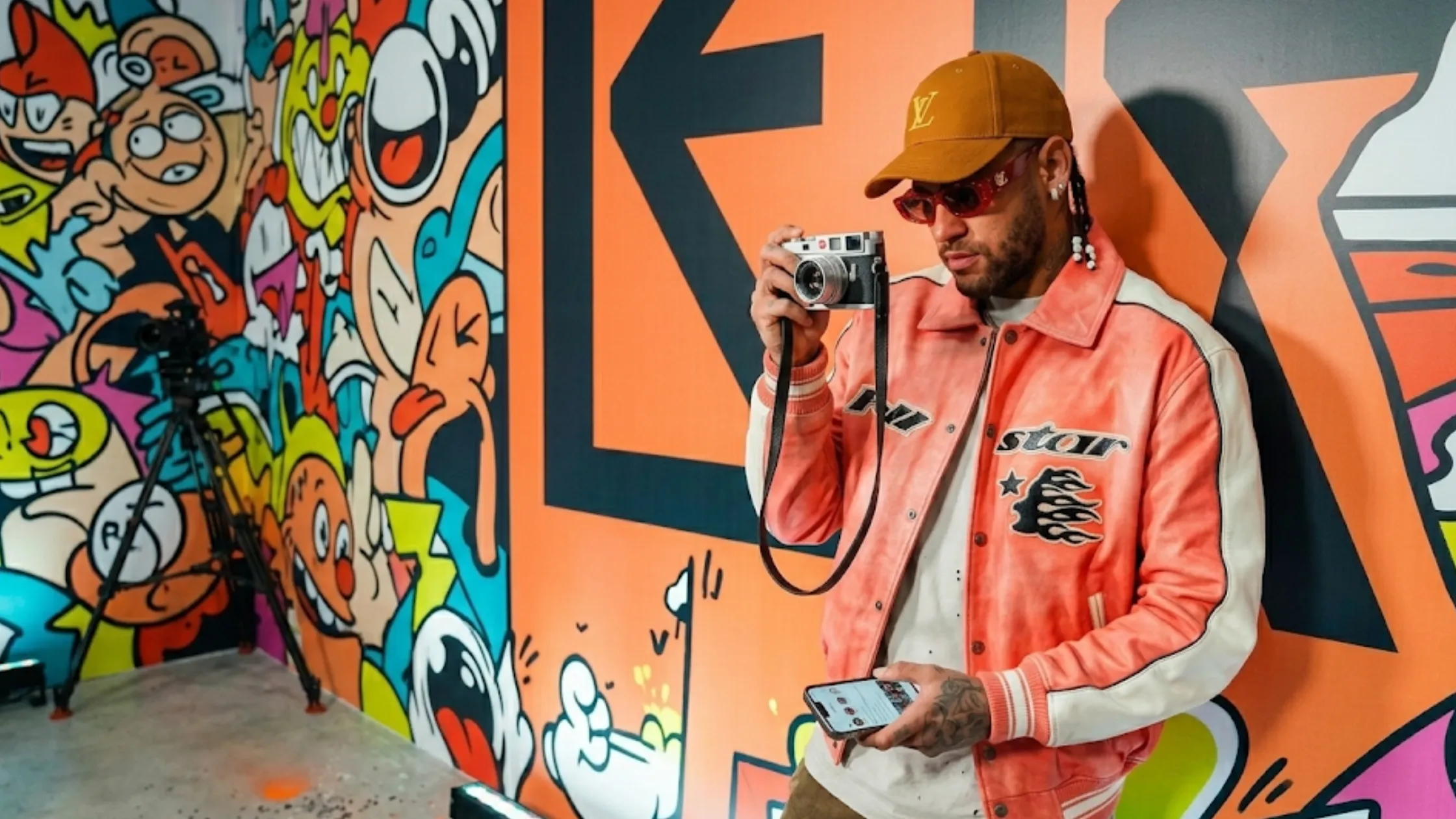 Neymar Hellstar Avirex peach leather varsity jacket with flame graphic, white sleeves, snap button closure, and gothic chest branding