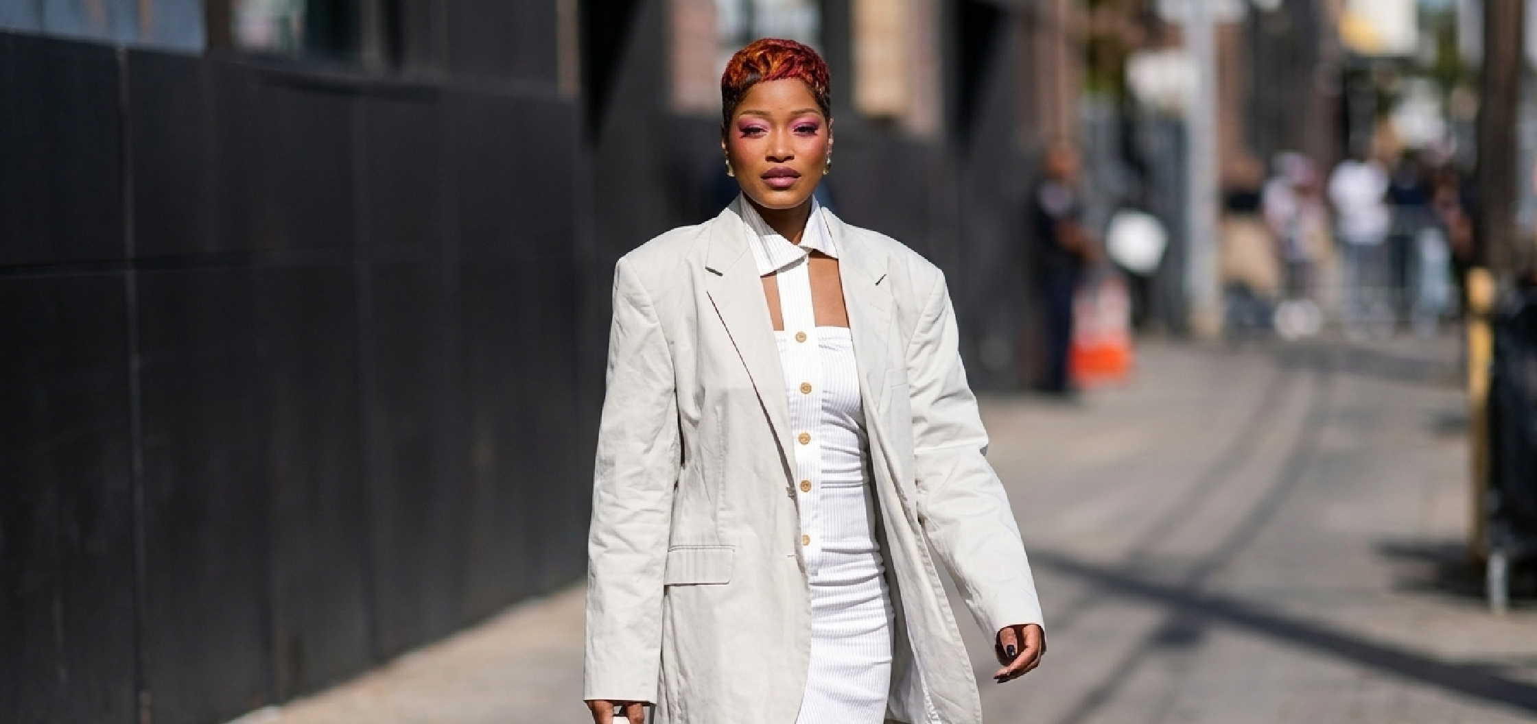 Keke Palmer wearing an oversized beige cotton blazer in Los Angeles 2026 with notch lapels and flap pockets, styled in modern street fashion