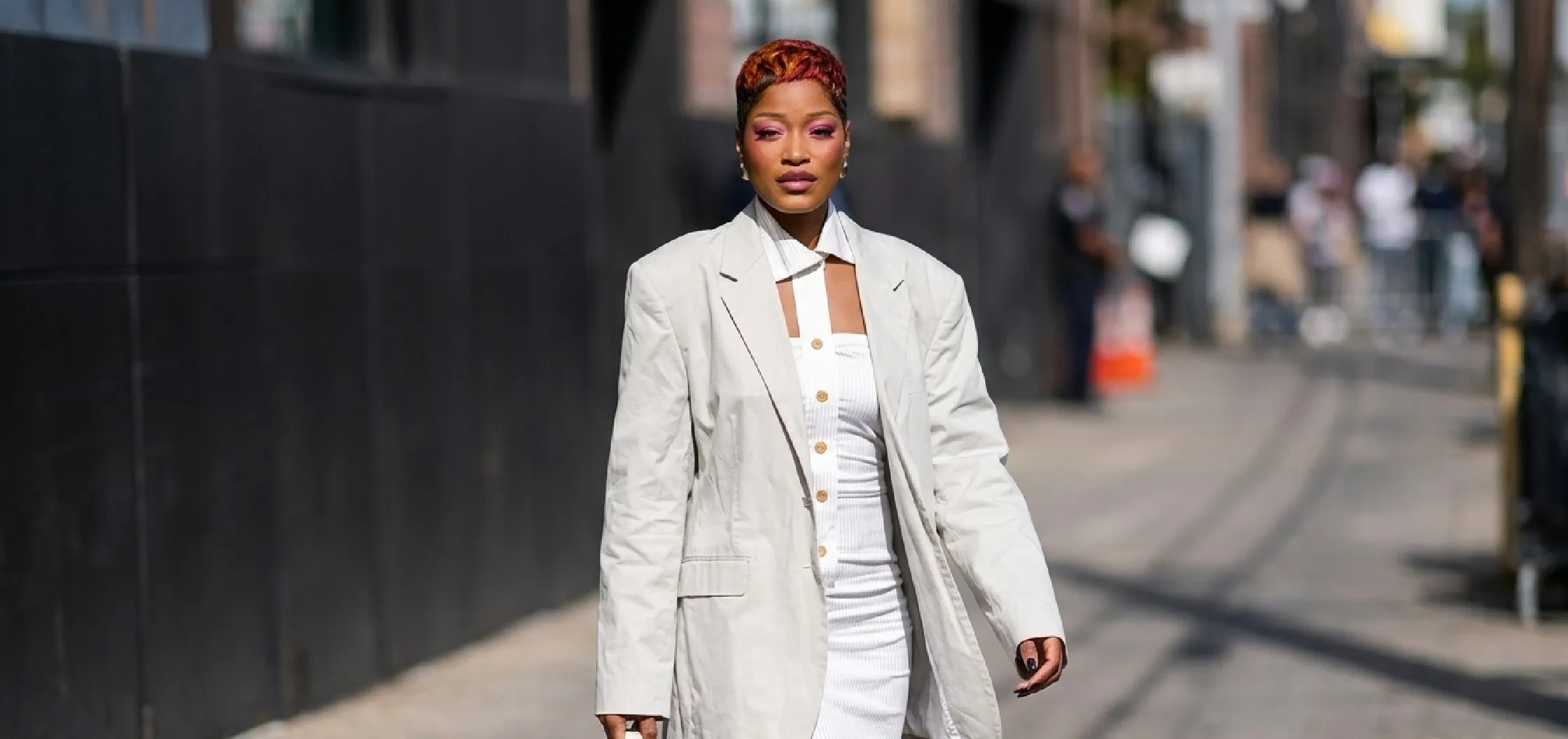 Keke Palmer wearing an oversized beige cotton blazer in Los Angeles 2026 with notch lapels and flap pockets, styled in modern street fashion