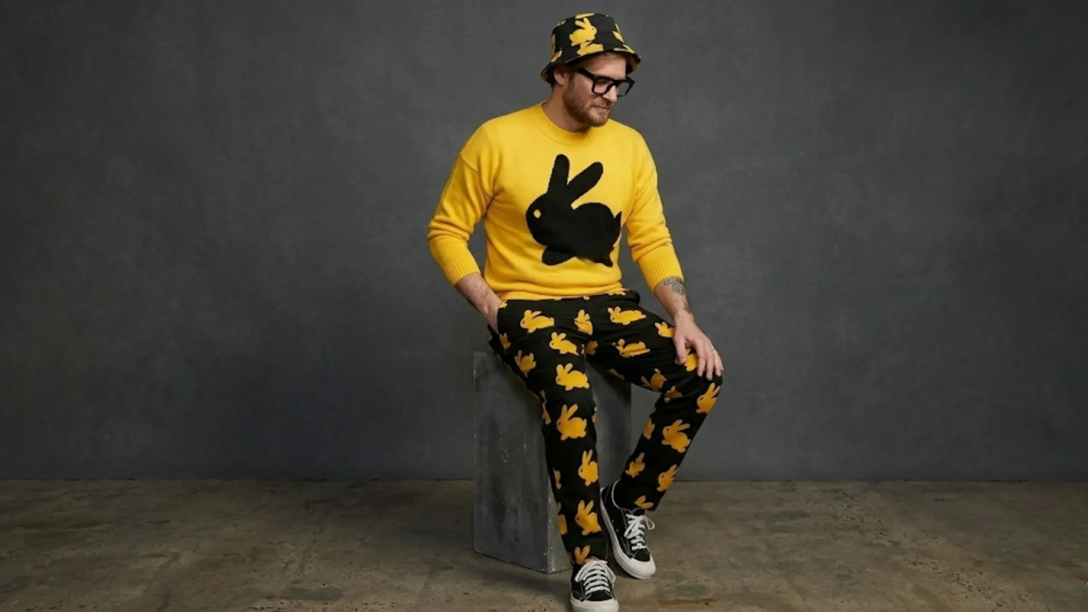 Bryan Fuller Dust Bunny yellow unisex sweatshirt with black rabbit graphic knit design