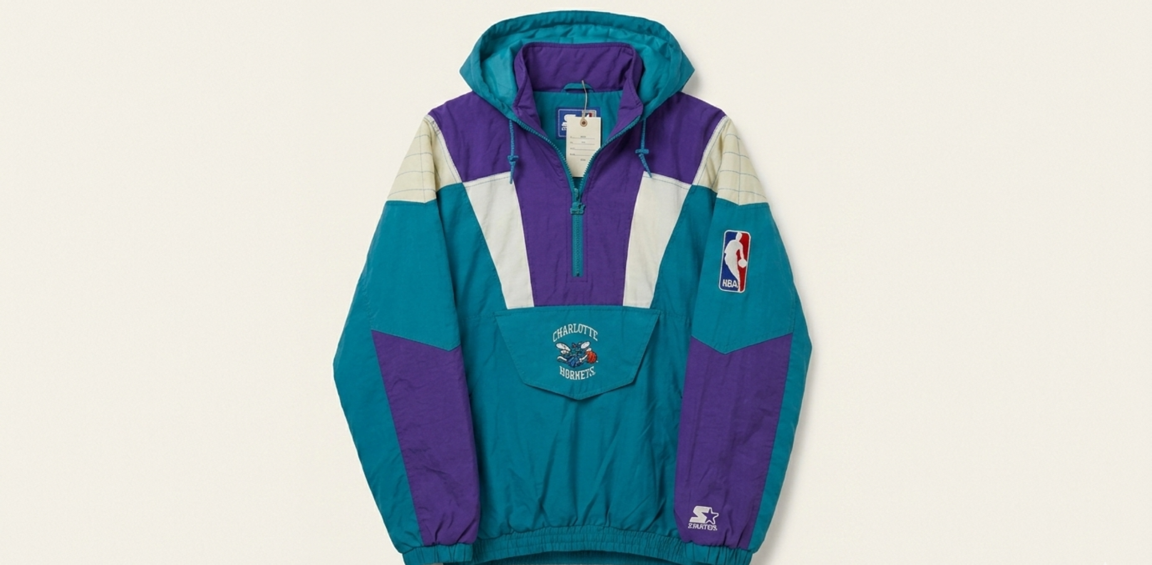 Charlotte Hornets Starter Jacket retro 90s NBA streetwear hooded jacket in teal purple and white with embroidered Hugo the Hornet mascot and vintage color-block design