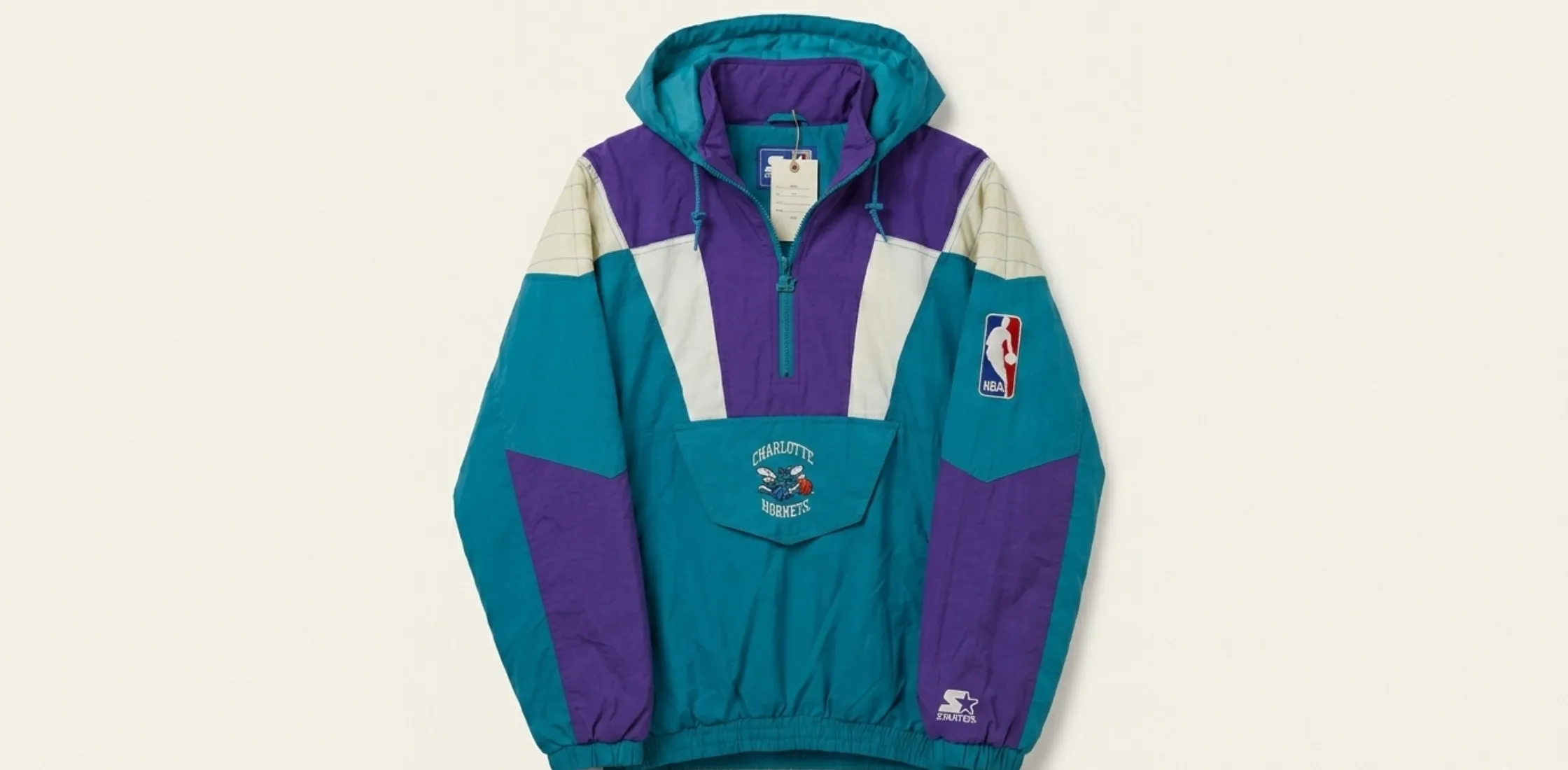 Charlotte Hornets Starter Jacket retro 90s NBA streetwear hooded jacket in teal purple and white with embroidered Hugo the Hornet mascot and vintage color-block design