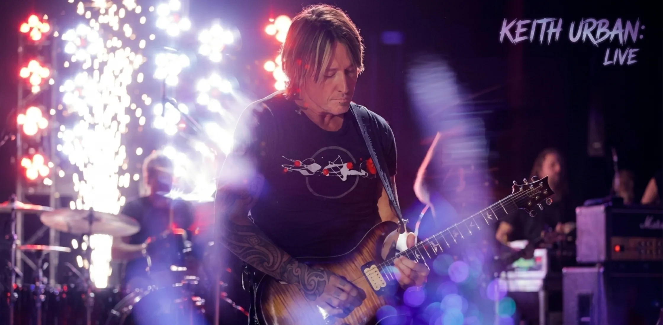 Keith Urban New Year’s Eve Live graphic T-shirt with bold concert-inspired design and red accent artwork