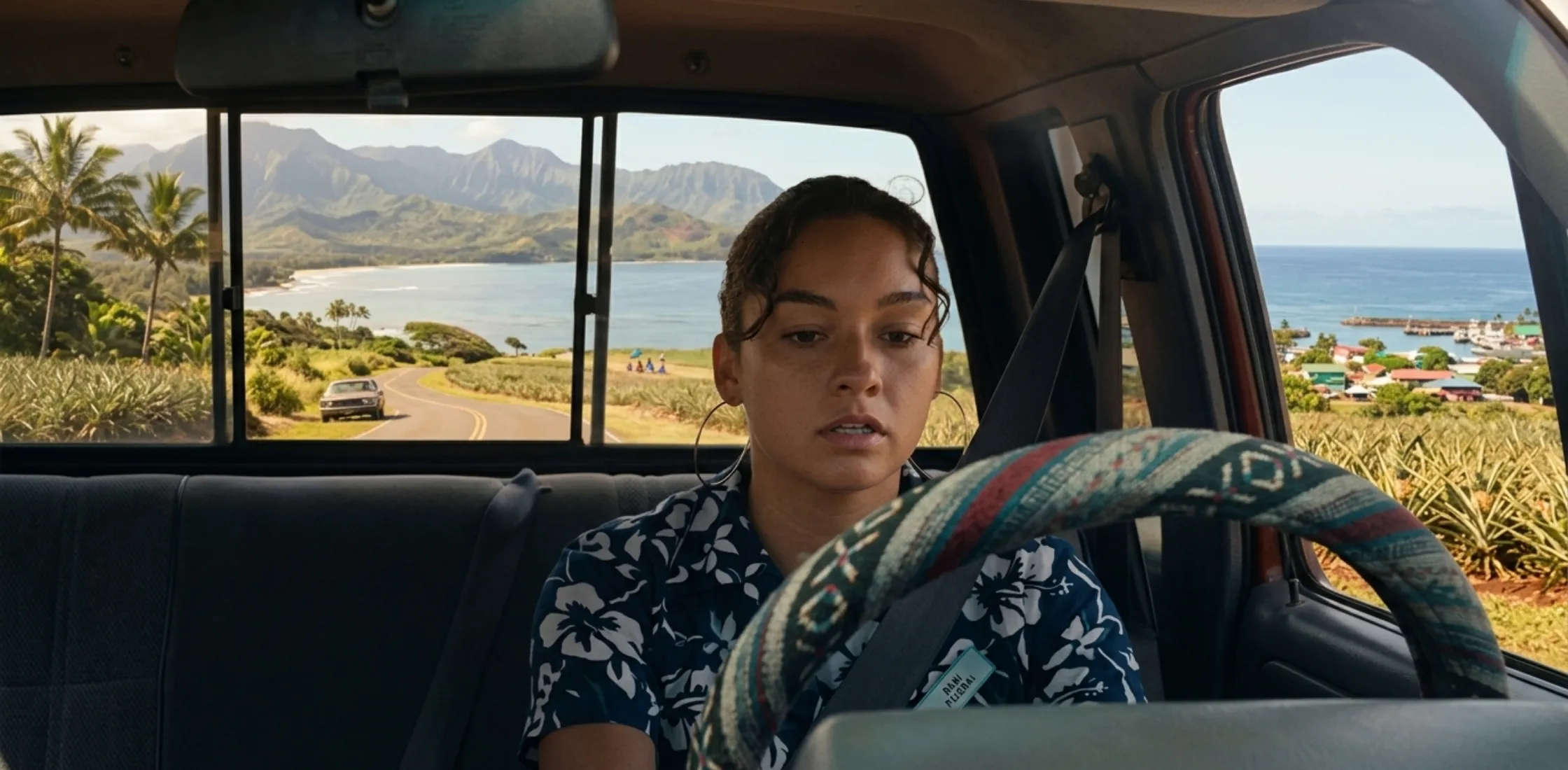 Sydney Agudong Lilo & Stitch dark navy floral shirt with white hibiscus print styled for effortless island chic fashion look