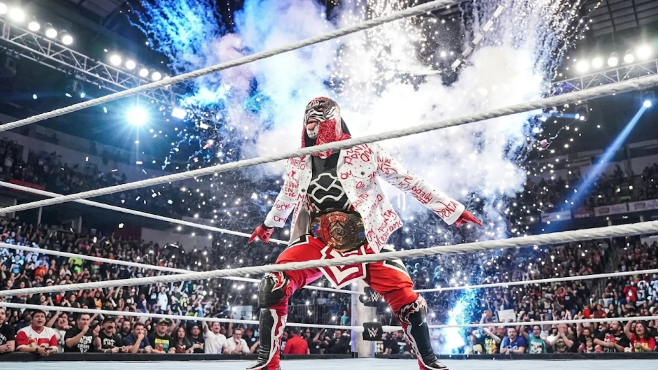 Penta Monday Night RAW 2026 white oversized denim trucker jacket with red lucha libre graffiti print wrestling-inspired streetwear outfit