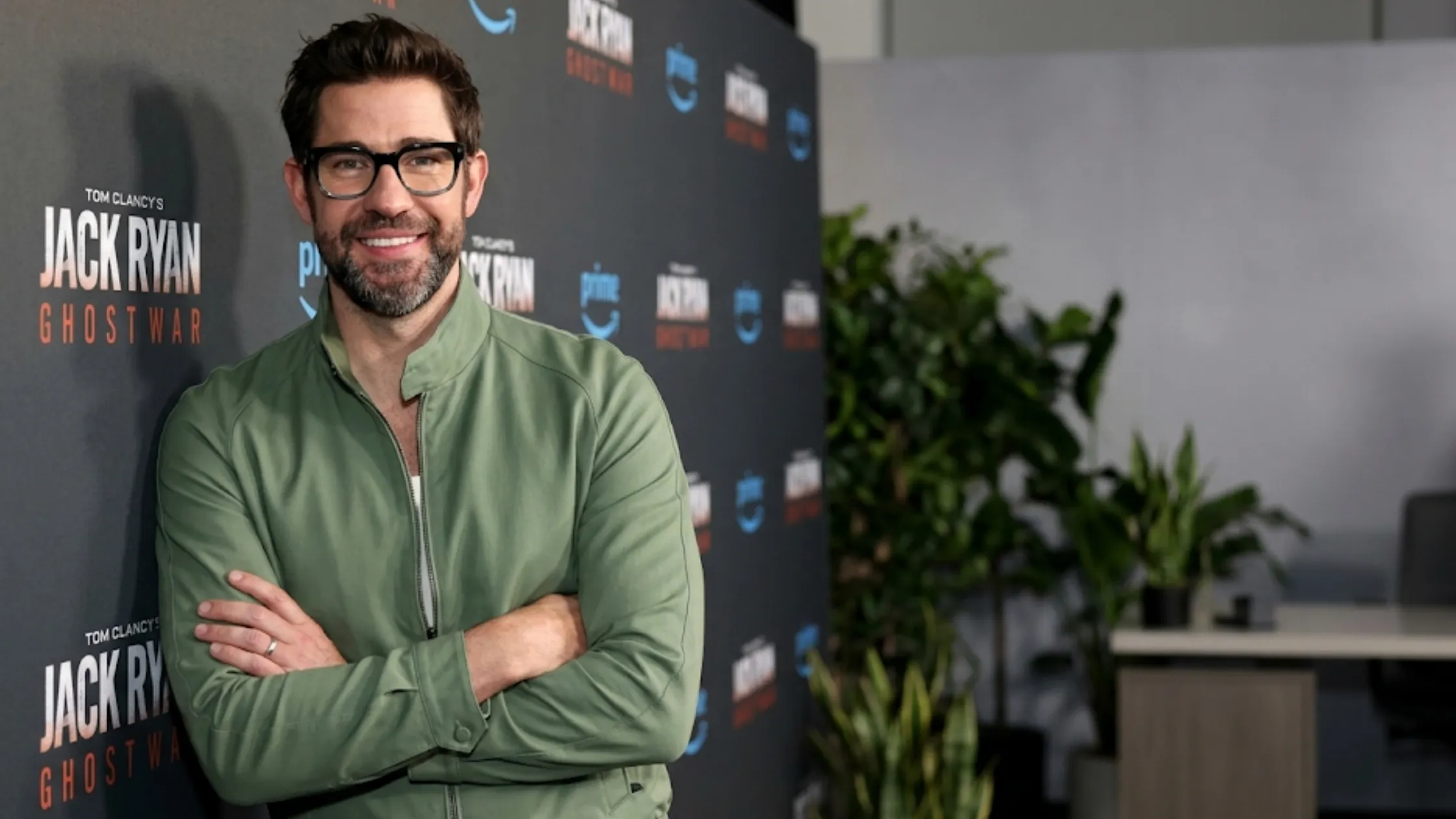 John Krasinski Jack Ryan Ghost War world premiere green Harrington jacket dual zip sage olive smart casual celebrity red carpet look