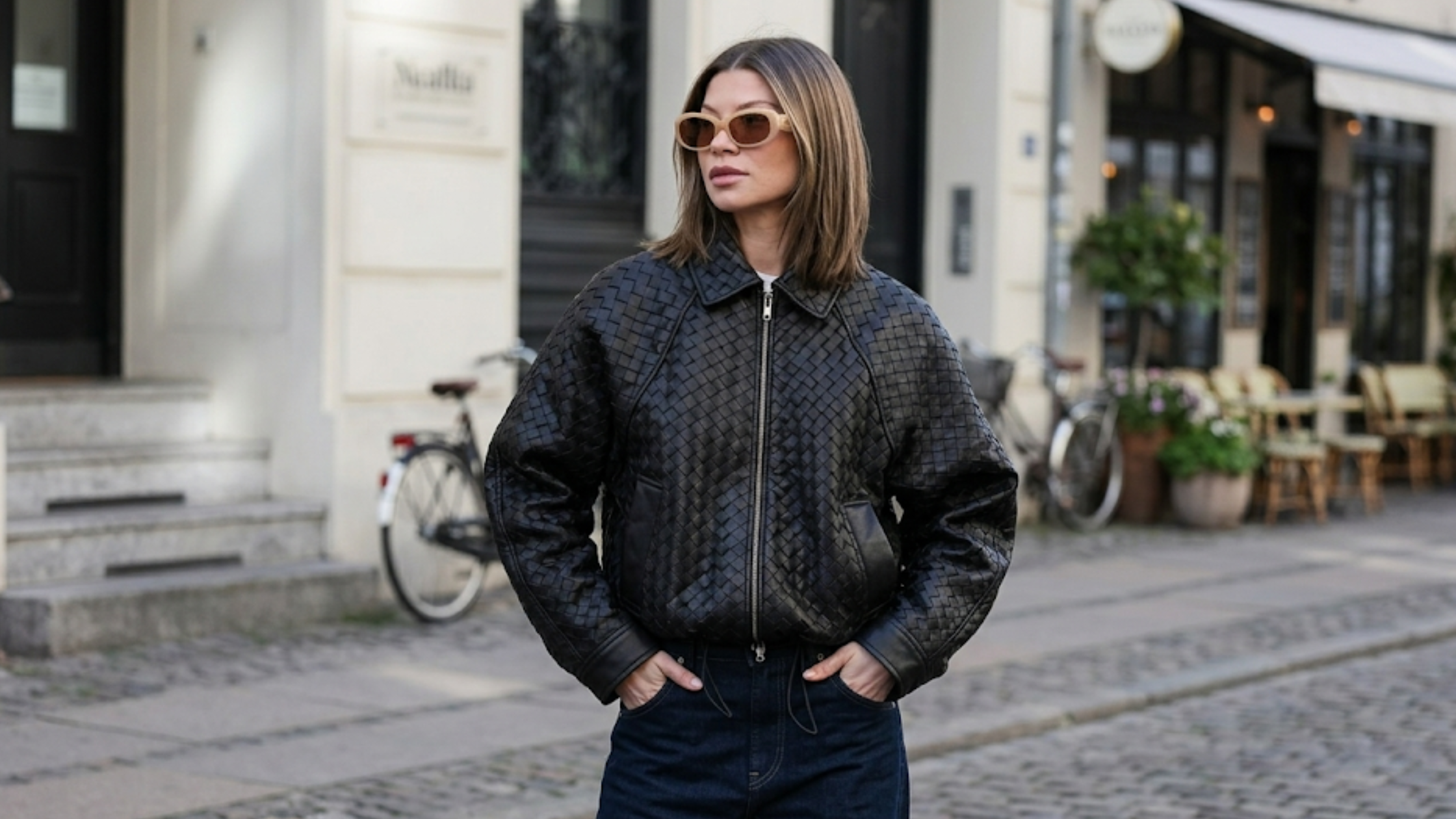 Sophia Geiss black woven texture leather jacket intrecciato basketweave design silver zipper raglan sleeves luxury streetwear outfit Berlin 2026