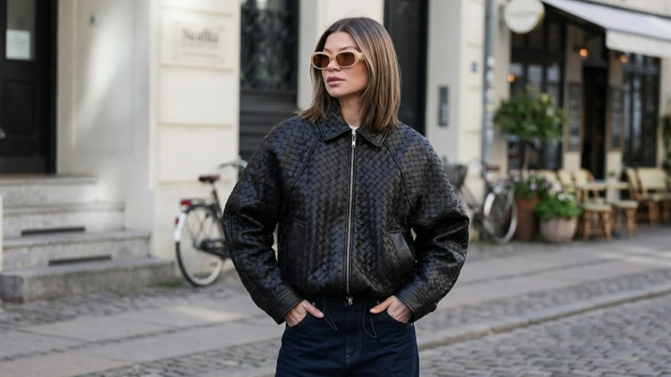 Sophia Geiss black woven texture leather jacket intrecciato basketweave design silver zipper raglan sleeves luxury streetwear outfit Berlin 2026