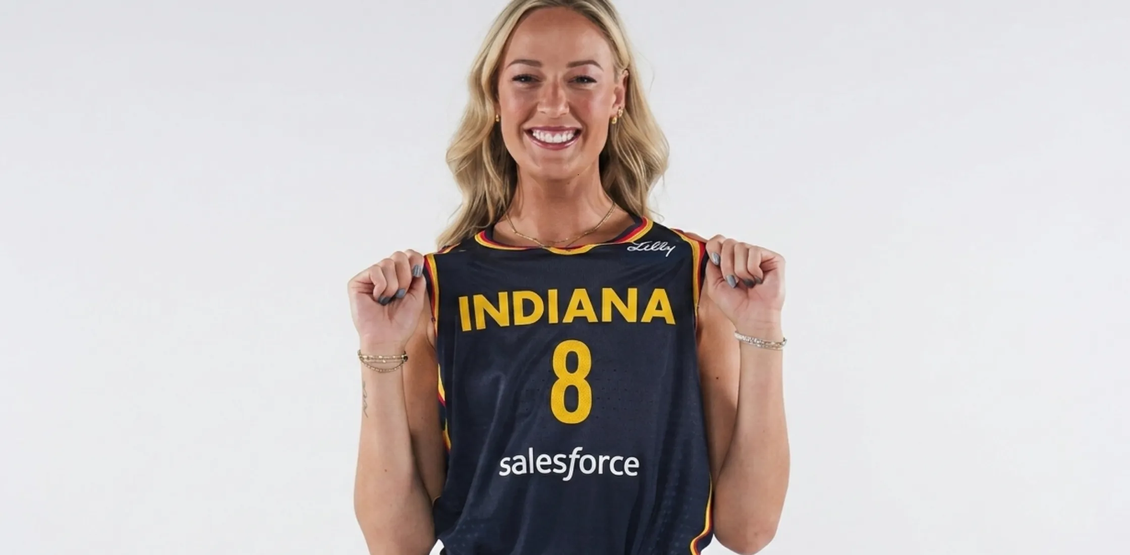 Sophie Cunningham Indiana Fever Media Day navy blue jersey with yellow block lettering, gold trim, and sponsor branding details