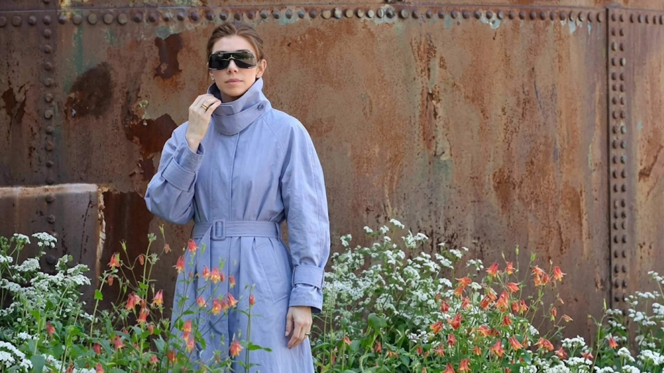 Vanessa Kirby NYC 2026 oversized blue maxi trench coat with high funnel neck and cape overlay futuristic fashion look