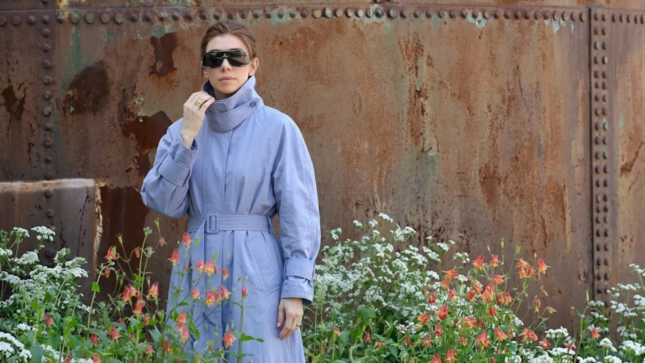 Vanessa Kirby NYC 2026 oversized blue maxi trench coat with high funnel neck and cape overlay futuristic fashion look