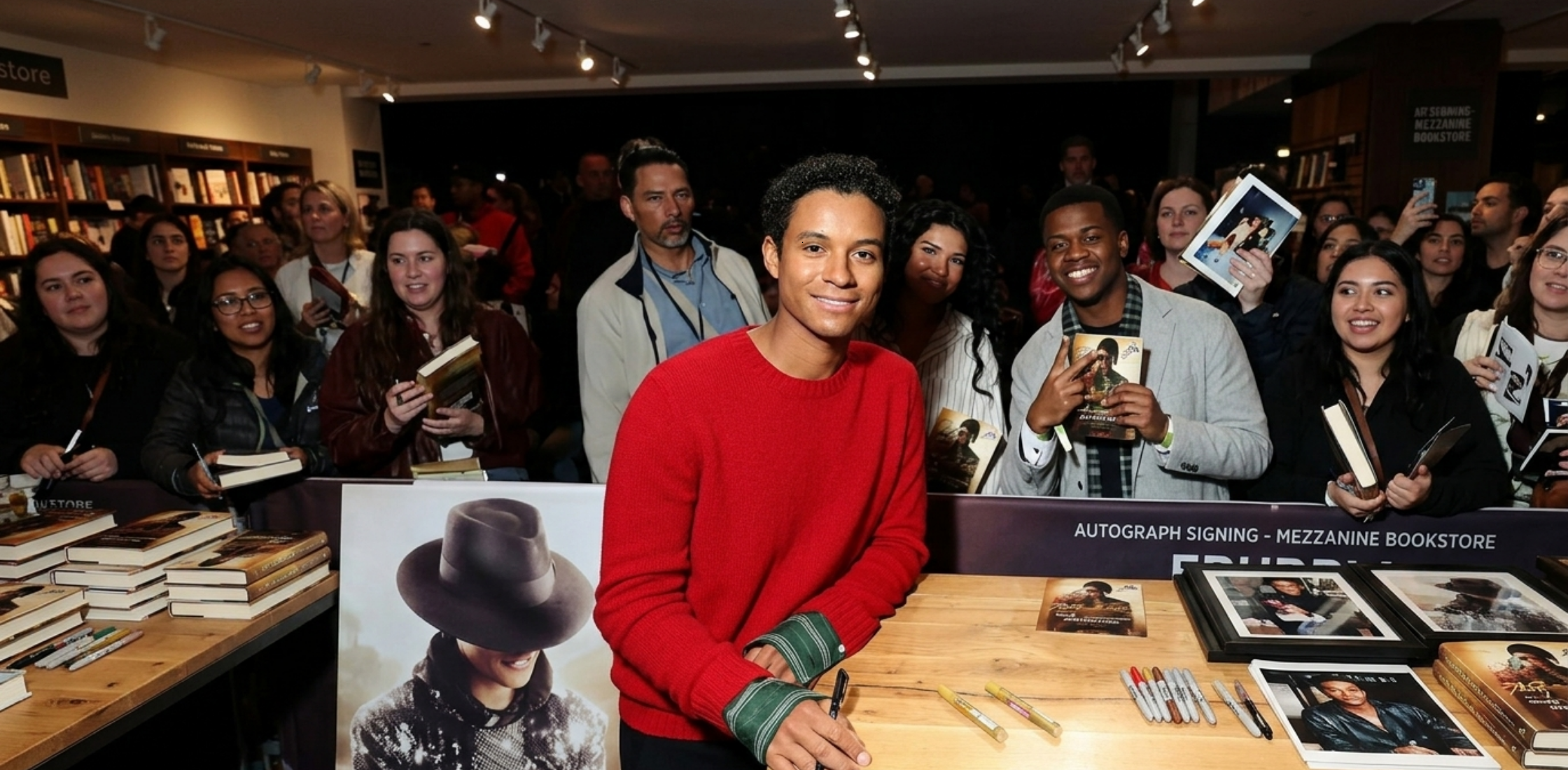 Jaafar Jackson wearing red fuzzy wool crewneck pullover sweater at Michael Global Fan Celebration 2026 Berlin red carpet event