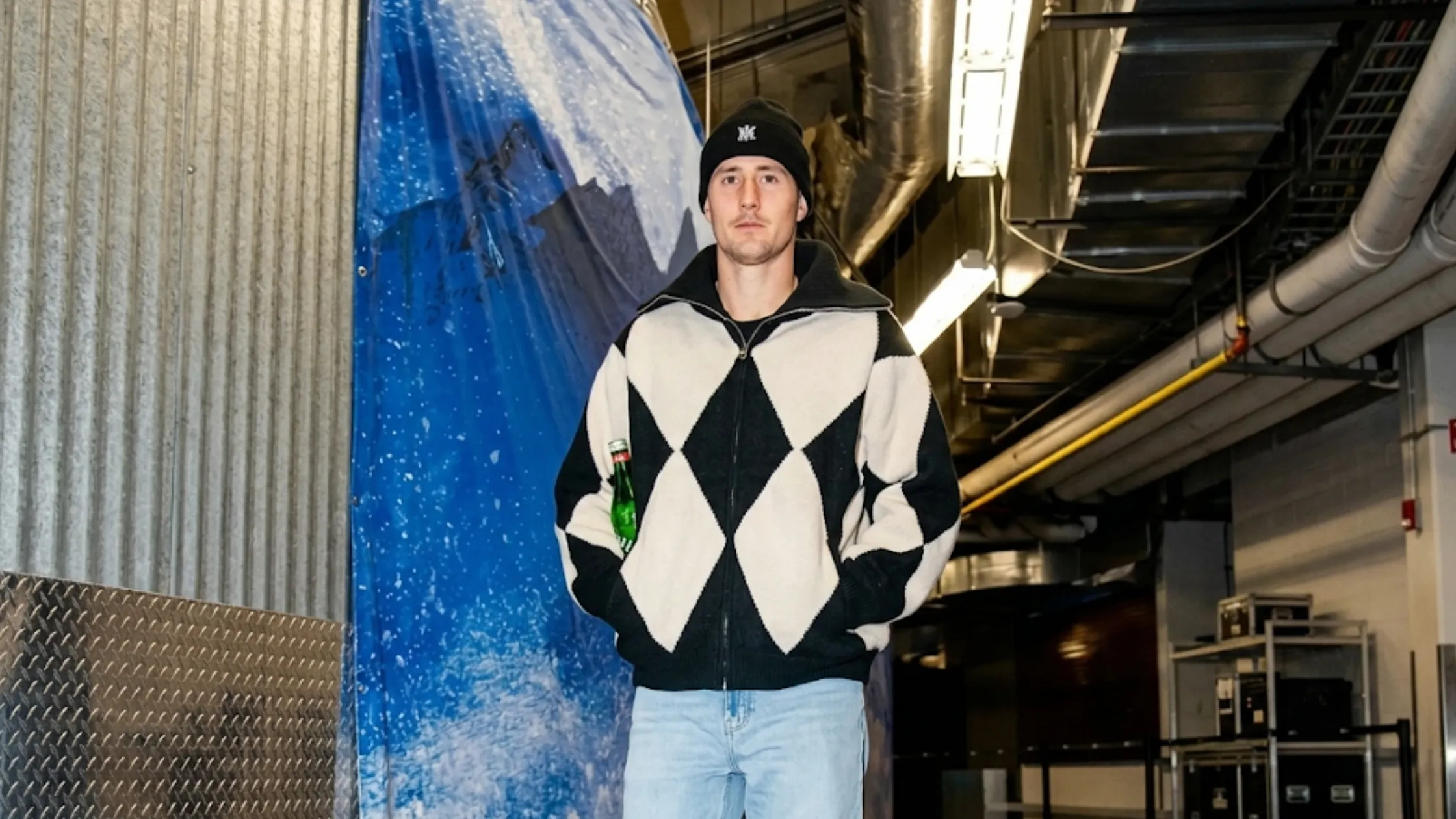 Martin Necas Colorado Avalanche black and white argyle zip-up sweater jacket with oversized fit and wide fold-down collar
