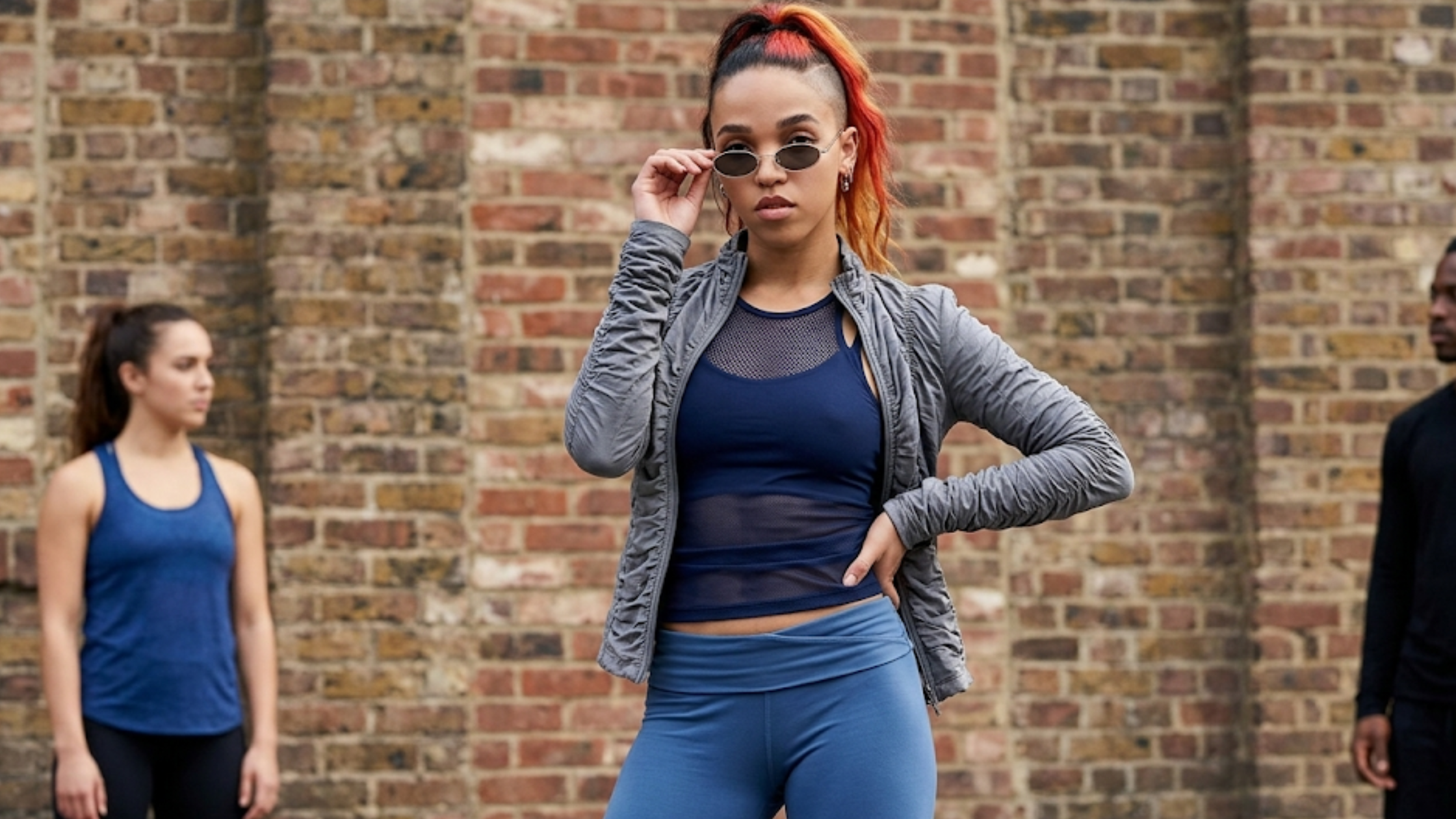 FKA Twigs Roundhouse London 2026 charcoal cropped jacket with ruched bubble texture, spread collar, and front zipper closure