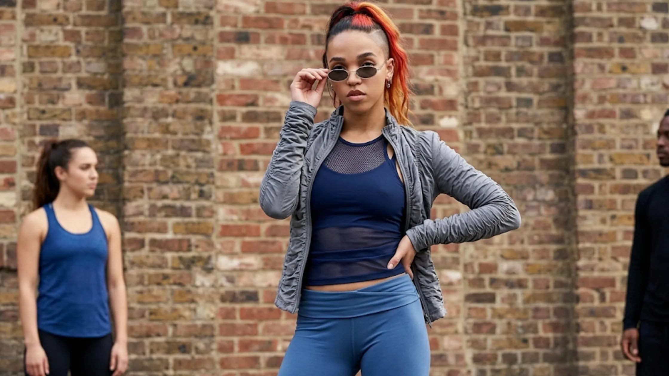 FKA Twigs Roundhouse London 2026 charcoal cropped jacket with ruched bubble texture, spread collar, and front zipper closure