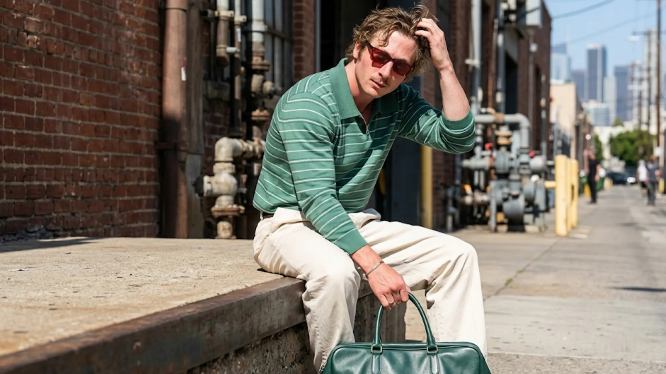 Jeremy Allen White Los Angeles 2026 sage green striped polo sweatshirt with Breton-style stripes and boxy fit