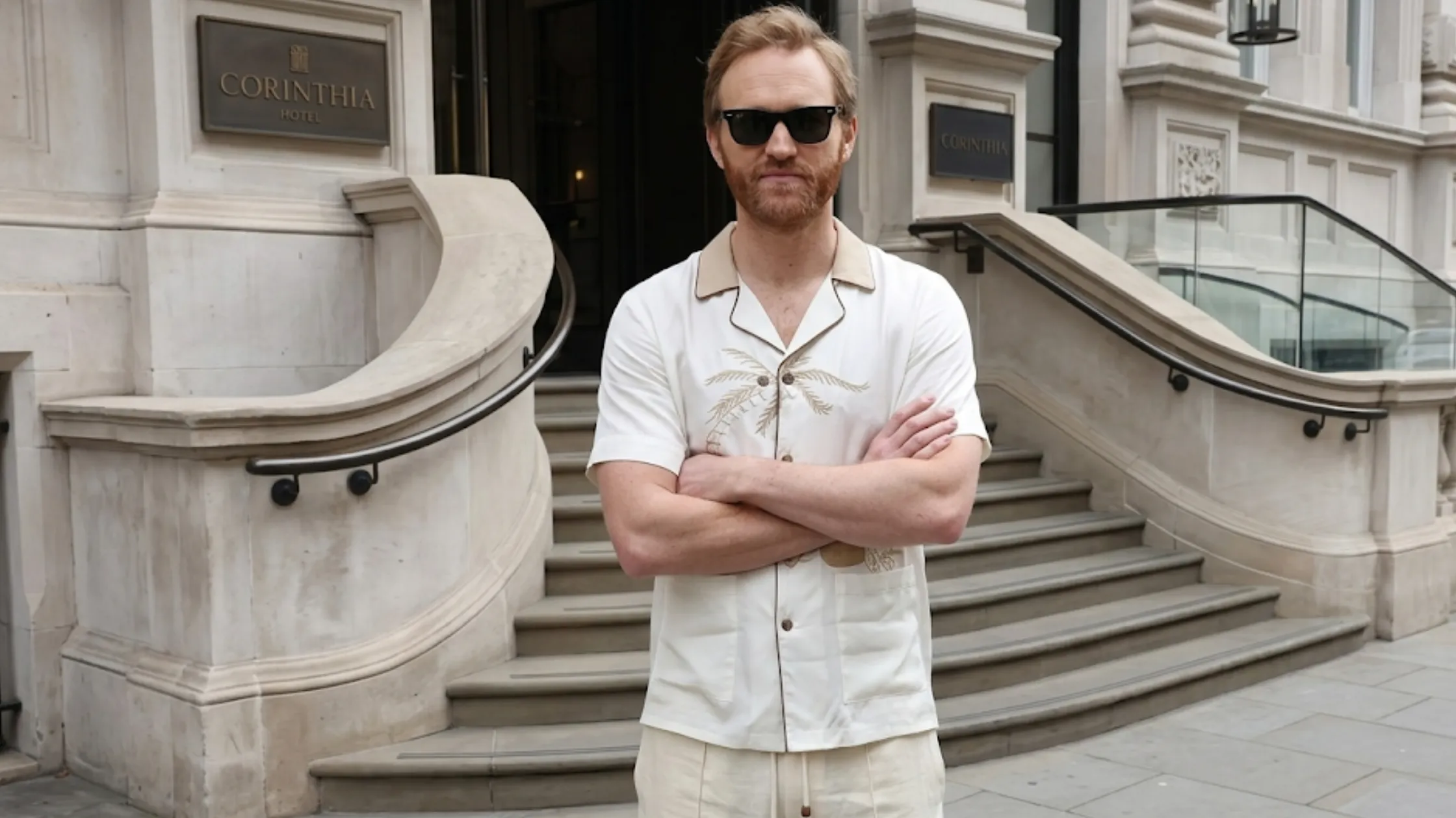 Wyatt Russell Disclosure Day London 2026 cream palm embroidered resort short sleeve shirt contrast collar