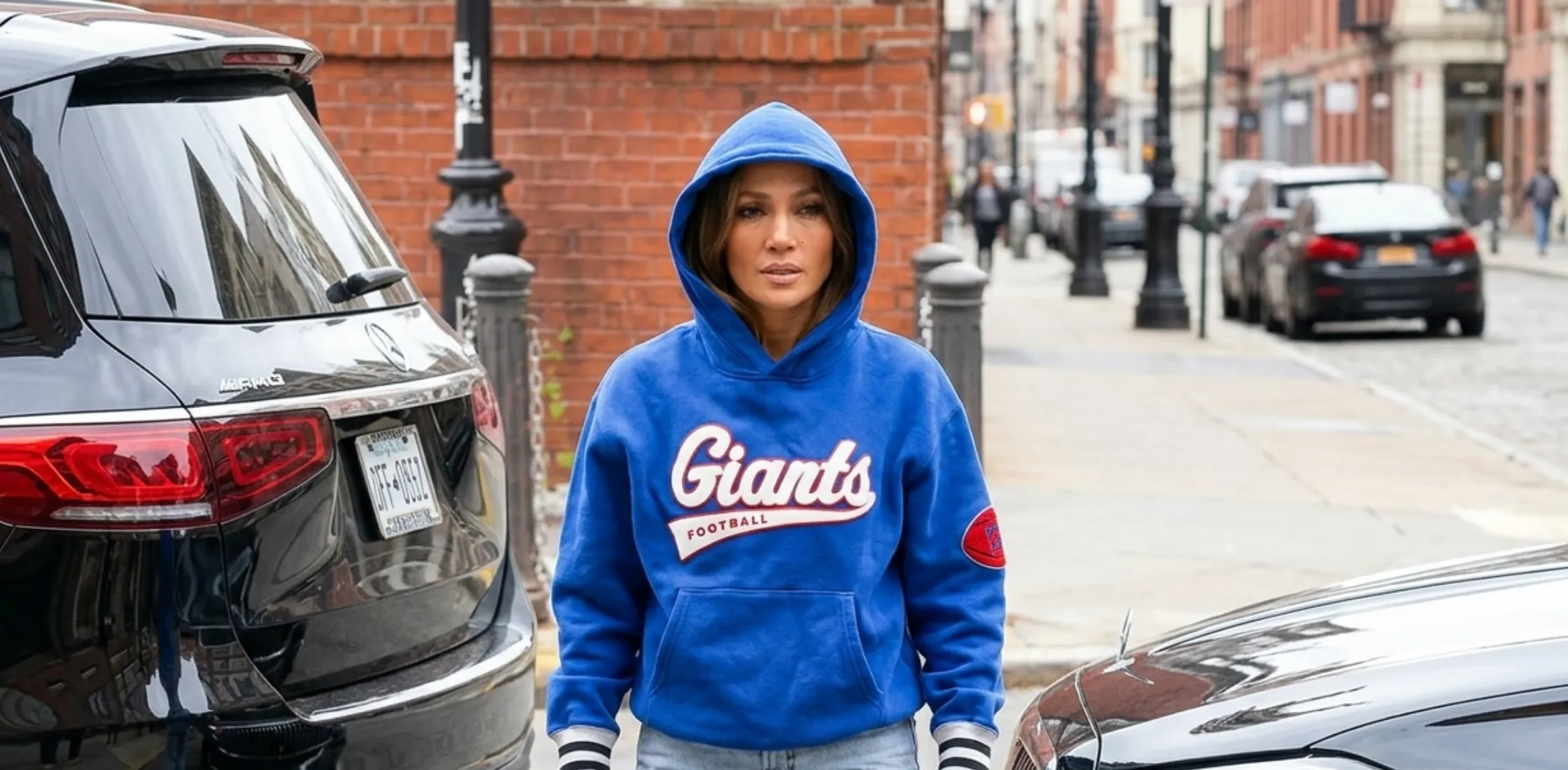 Jennifer Lopez New York Giants NFL Blue Hoodie spotted in Hoboken April 2025 celebrity streetwear look