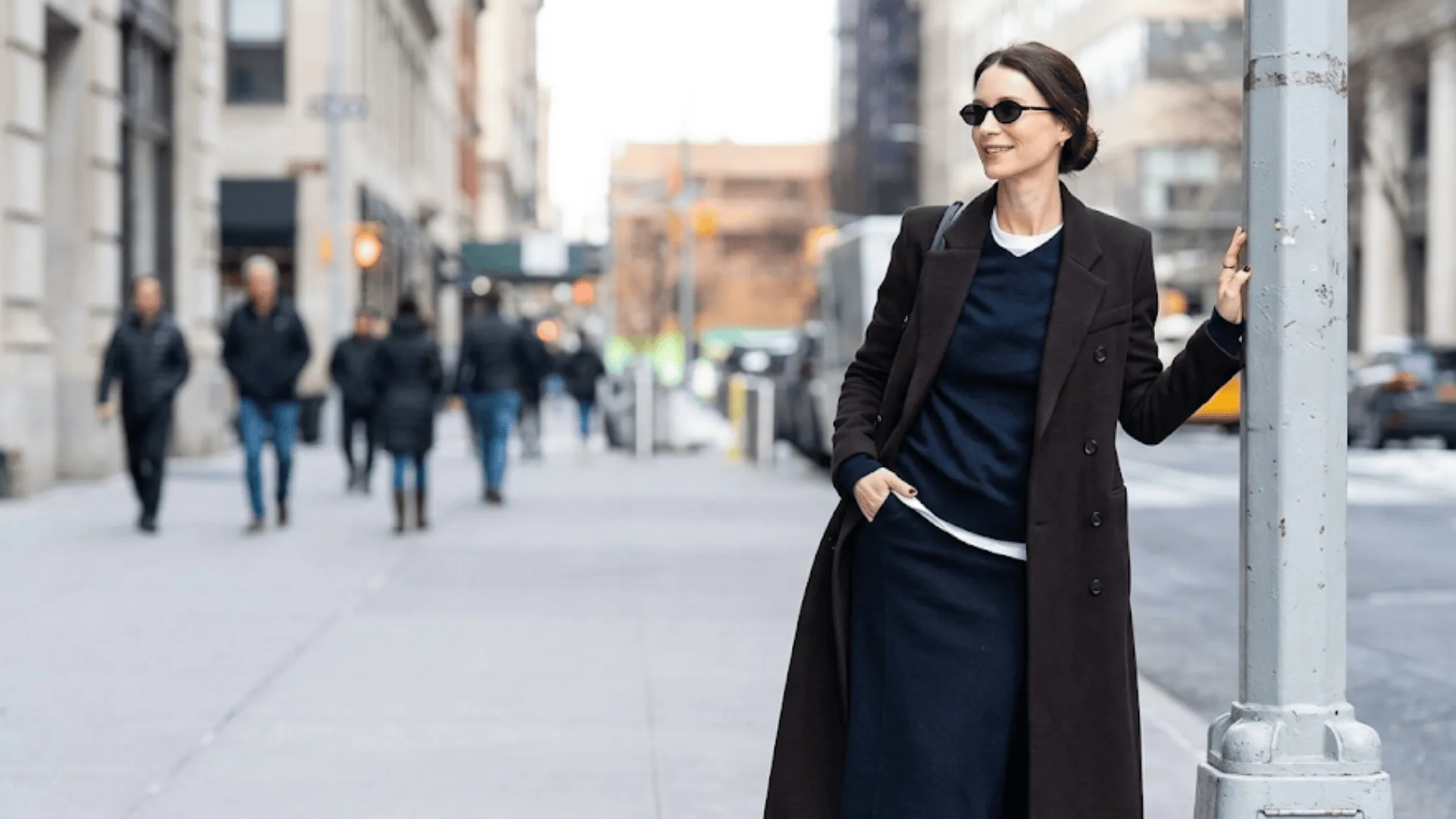 Caitriona Balfe inspired dark espresso brown wool maxi coat featuring a structured double-breasted silhouette and classic notch lapels.