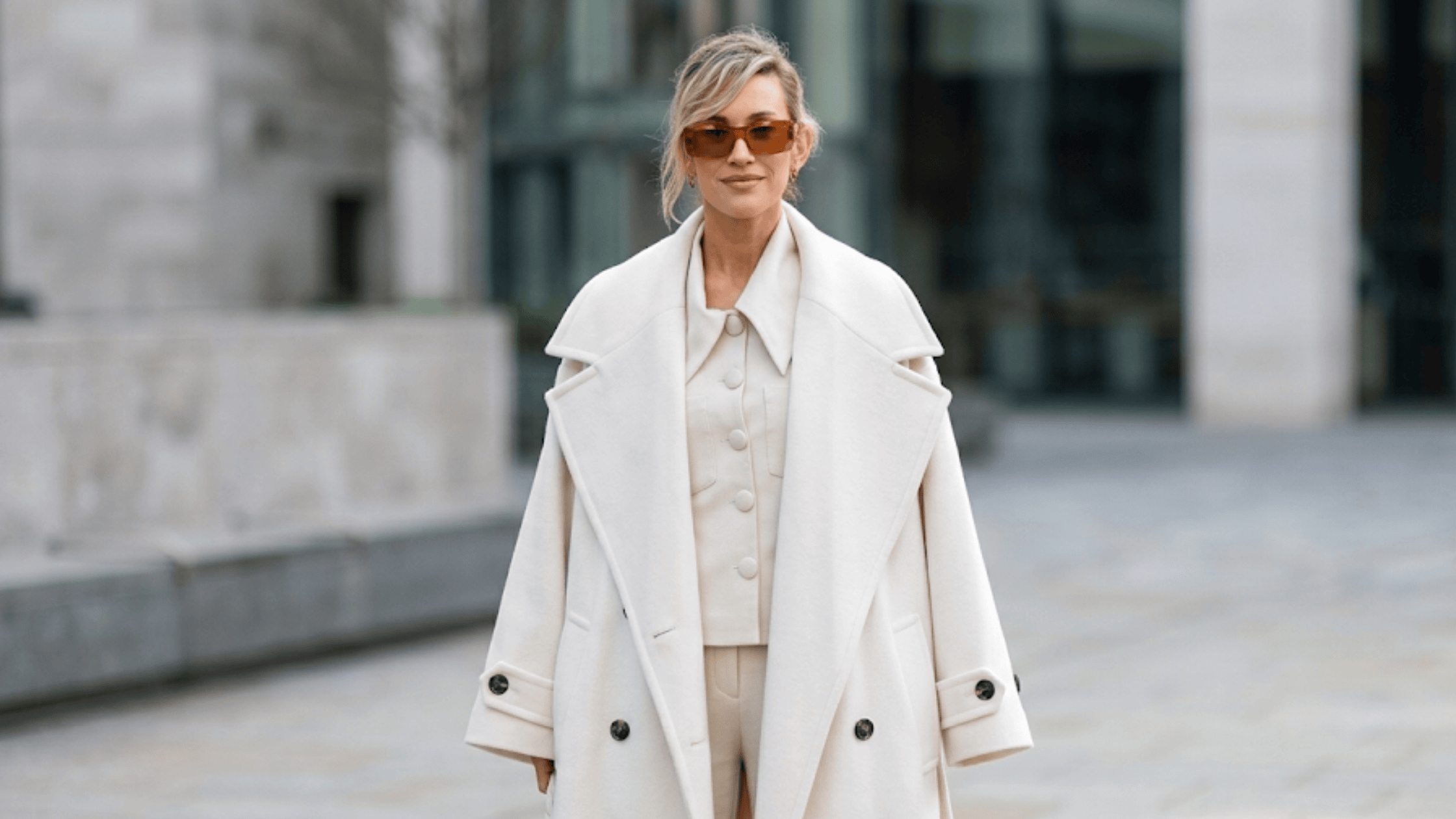 Ashley Roberts wearing an oversized white wool-blend wrap trench coat outside Global Studios in London.