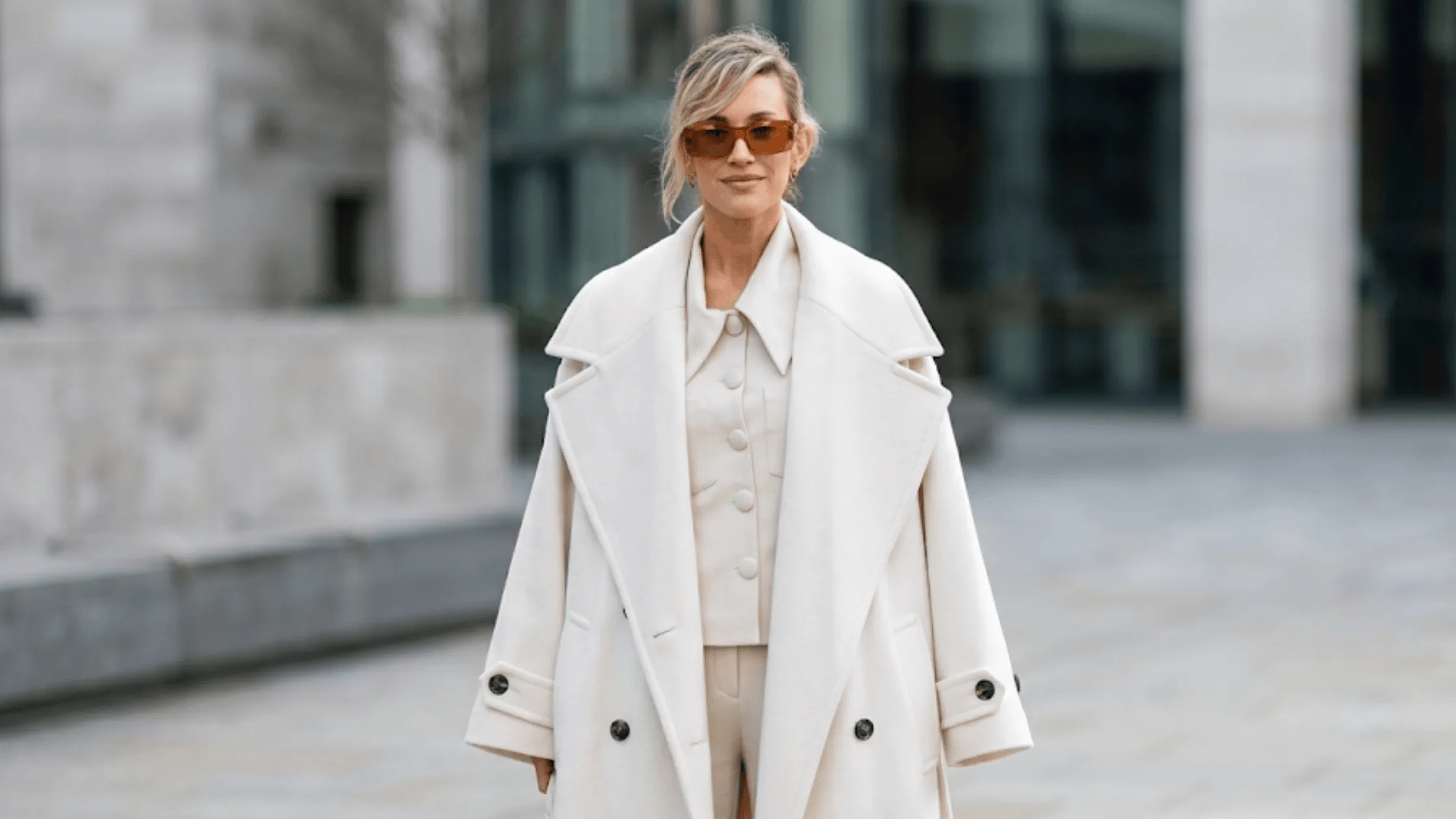 Ashley Roberts wearing an oversized white wool-blend wrap trench coat outside Global Studios in London.