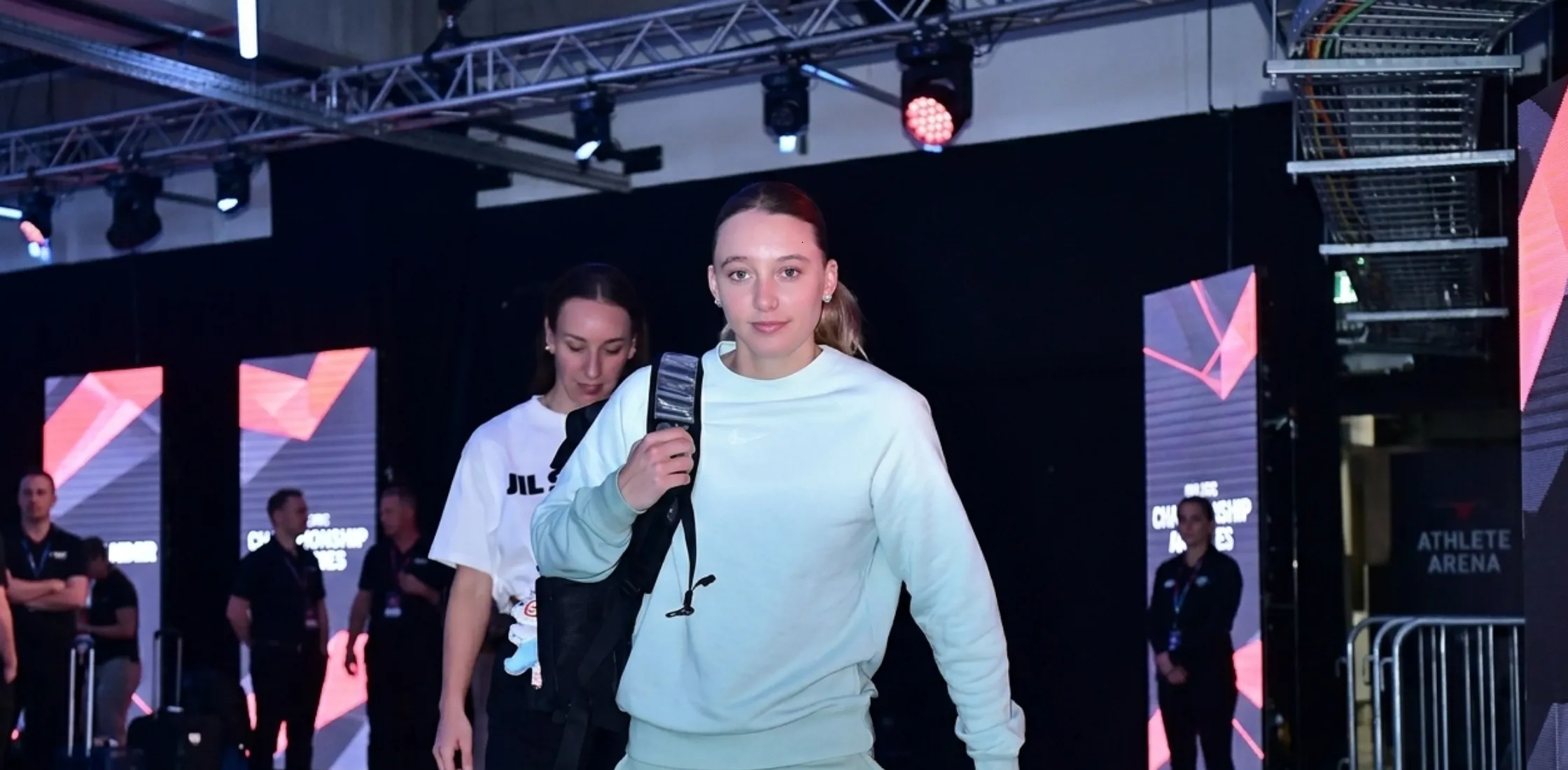 Paige Bueckers mint green crewneck sweatshirt inspired by Las Vegas Aces vs Dallas Wings game-day style with relaxed athletic fit and embroidered detail