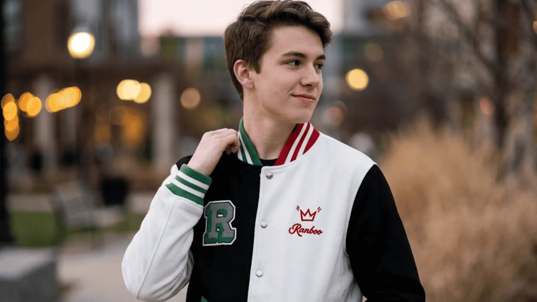 Black and white Ranboo Letterman Jacket with embroidered R logo and striped varsity trim.