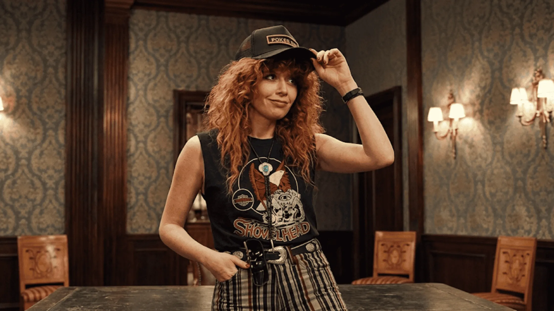 Natasha Lyonne as Charlie Cale wearing the black Shovelhead graphic tank top in Poker Face Season 2.