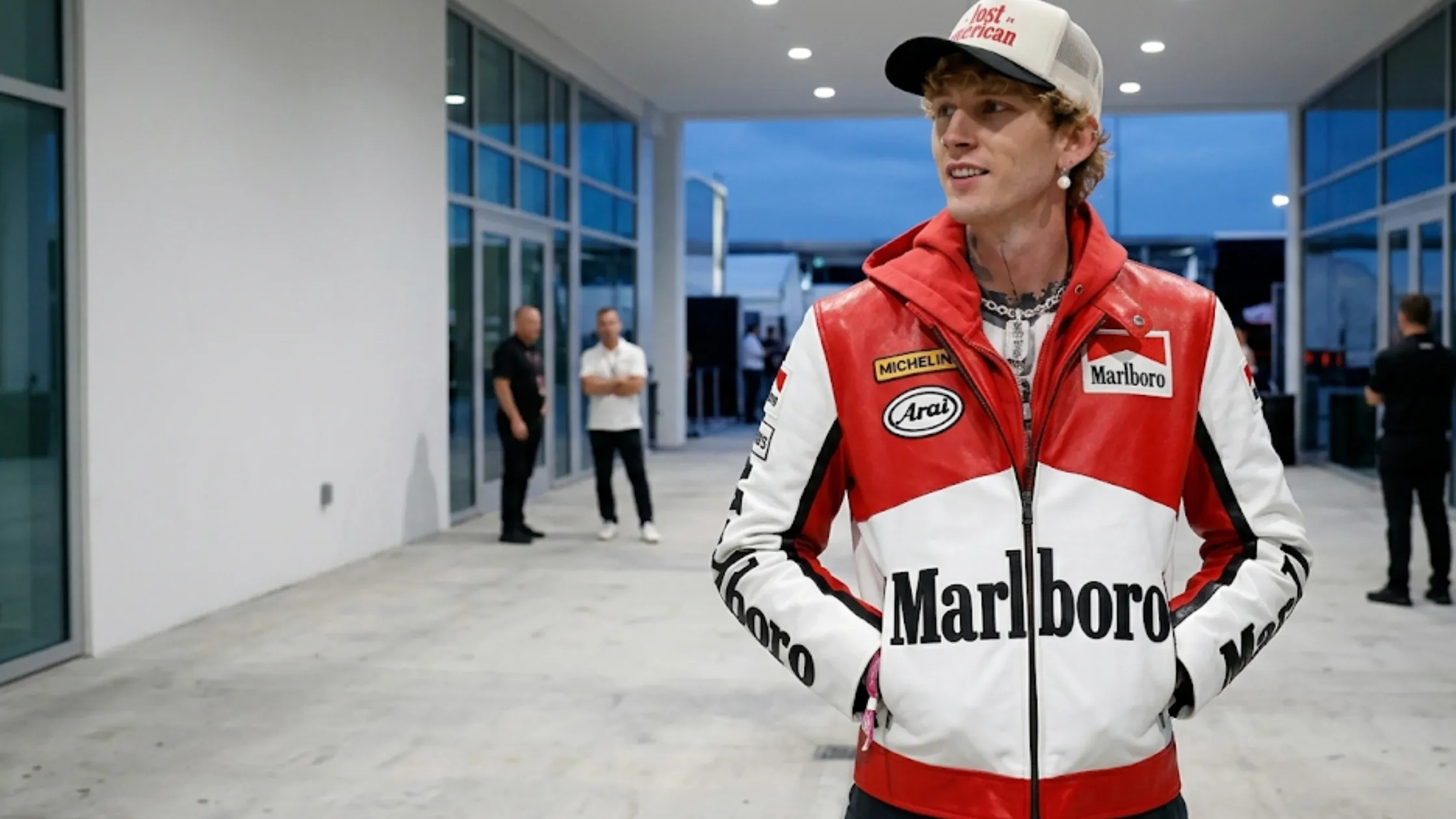 Machine Gun Kelly 2026 Las Vegas F1 Grand Prix red white Marlboro racing jacket leather motorsport streetwear luxury fashion