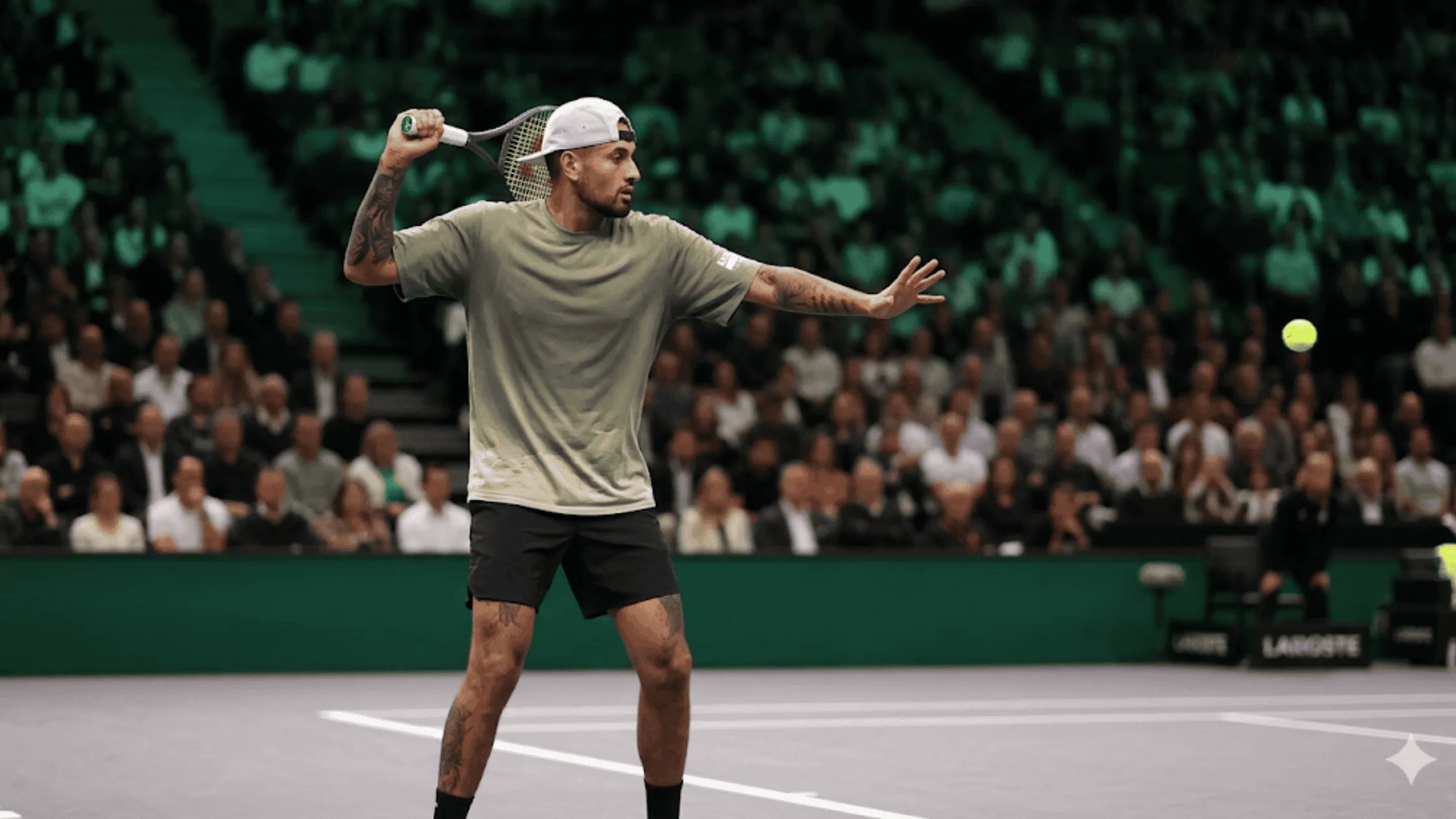 Nick Kyrgios in a sage green Lucky Energy oversized t-shirt playing tennis at the Dubai Showdown banner.