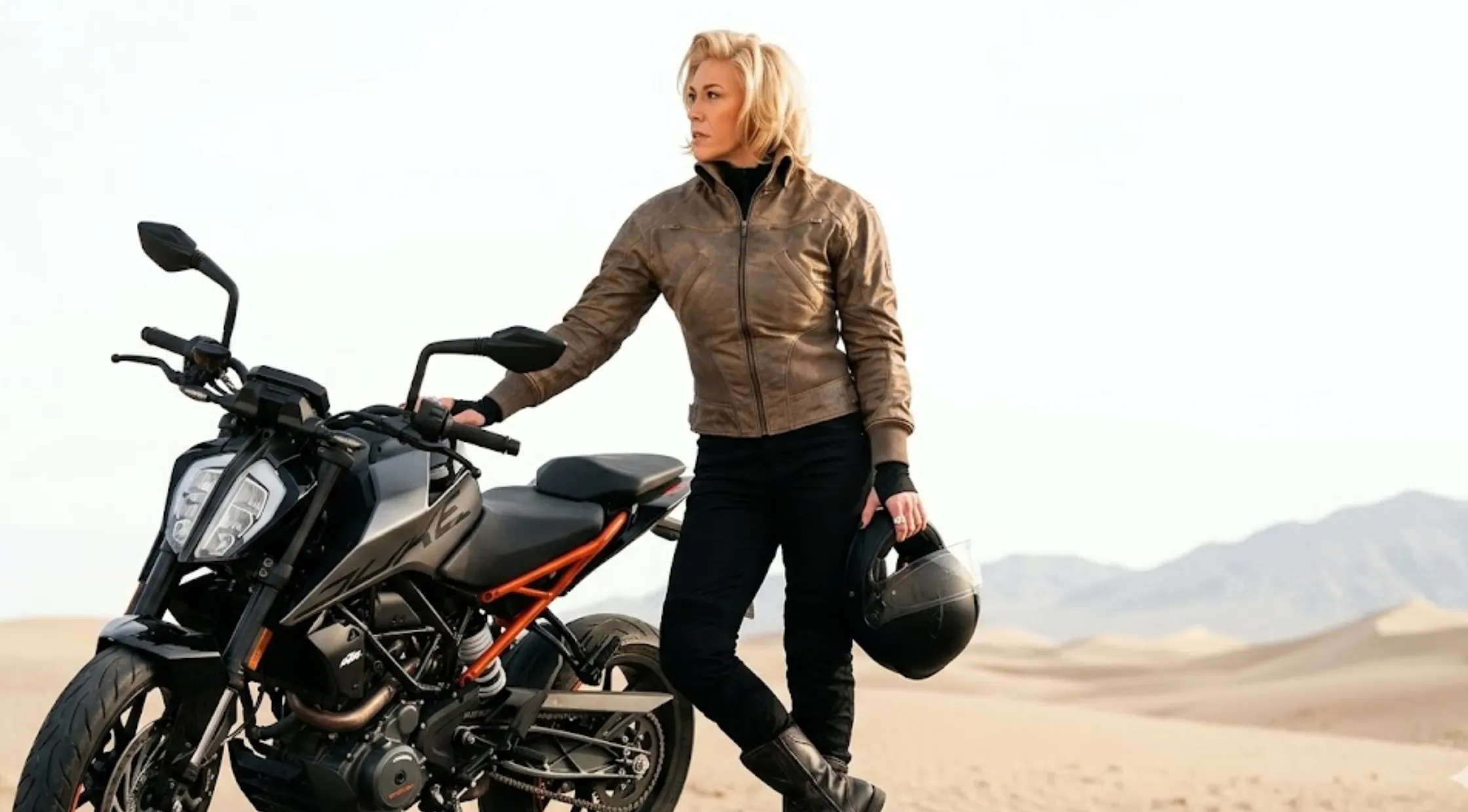 Hannah Waddingham Ride or Die Distressed Brown Café Racer Leather Jacket with Stand Collar and Zip Pockets