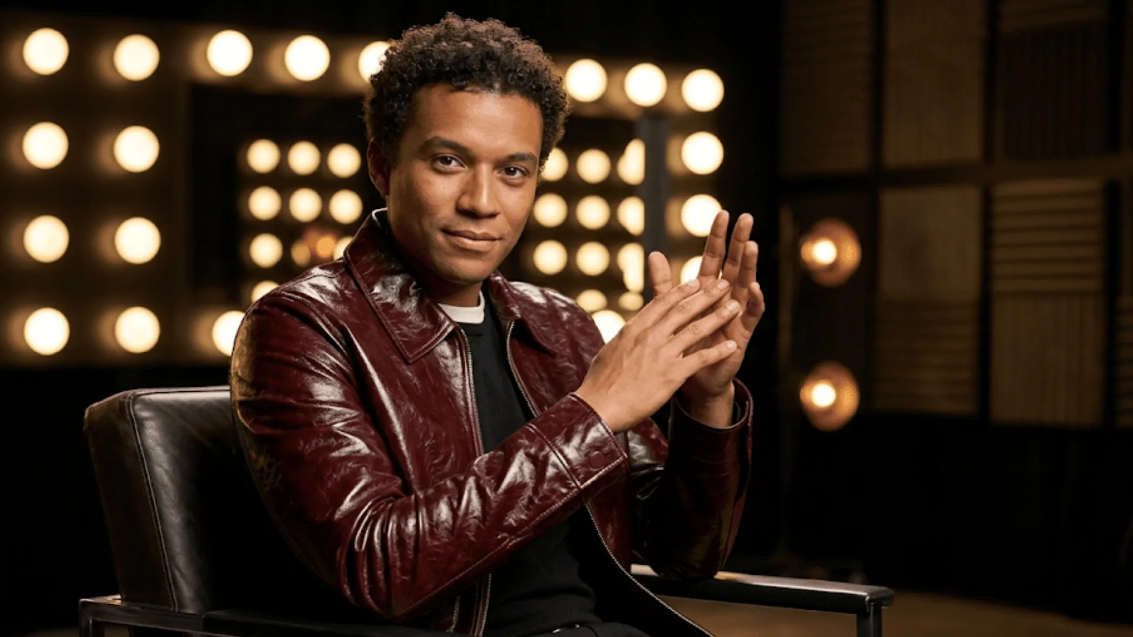 Jaafar Jackson Michael 2026 movie-inspired slim-fit oxblood burgundy leather bomber jacket with a high-shine polished finish and a pointed shirt collar.