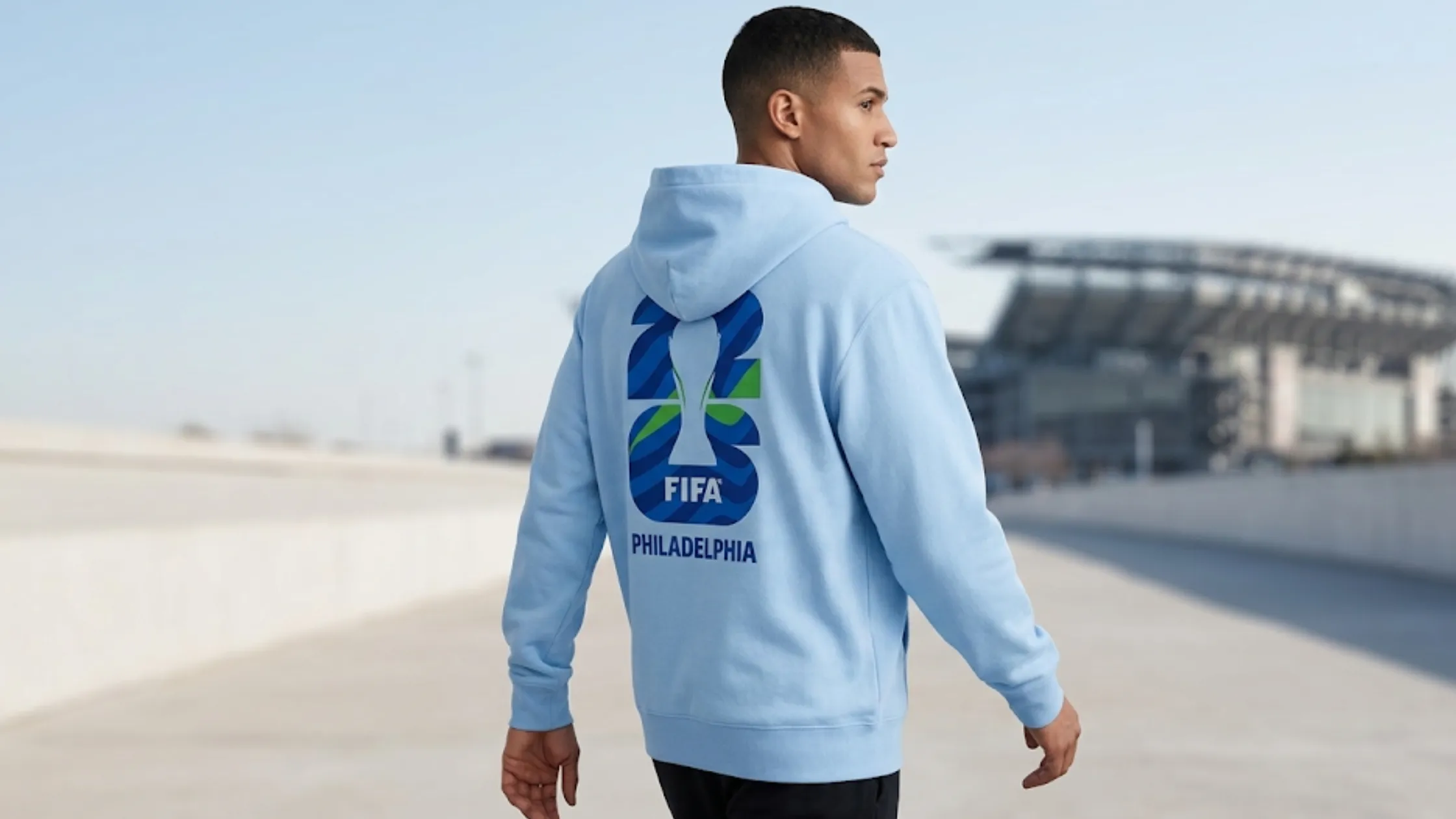 FIFA World Cup 2026 Philadelphia sky blue hoodie with vertical sleeve print, trophy chest graphic, and relaxed streetwear pullover design