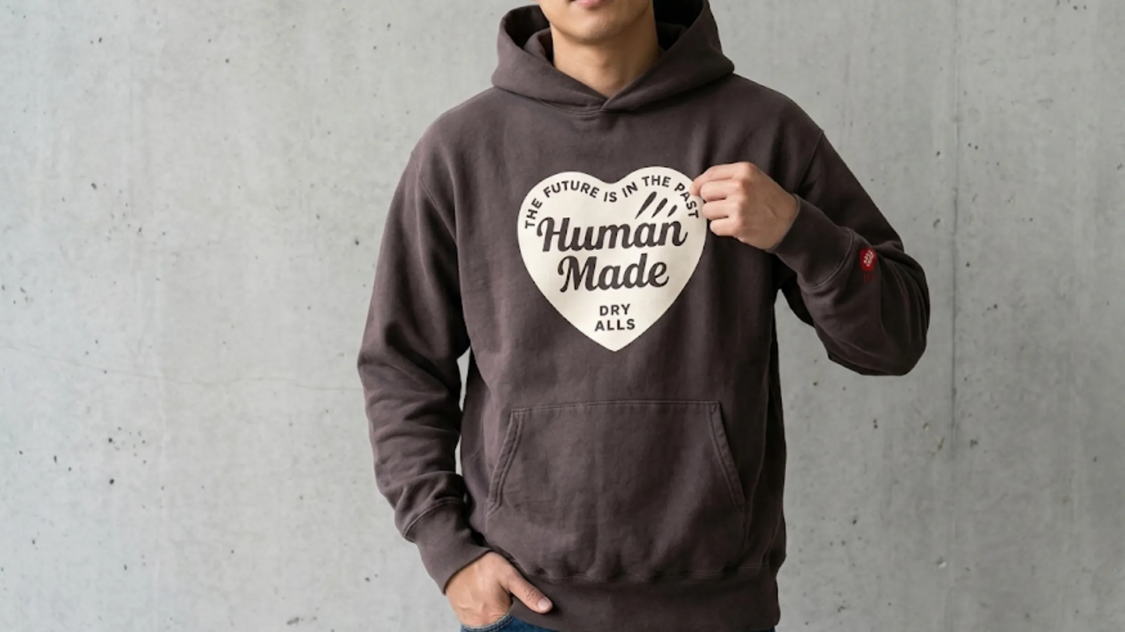 Human Made Tsuriami pullover hoodie with signature heart graphic, oversized vintage fit, ribbed cuffs, kangaroo pocket, and premium heavyweight construction.