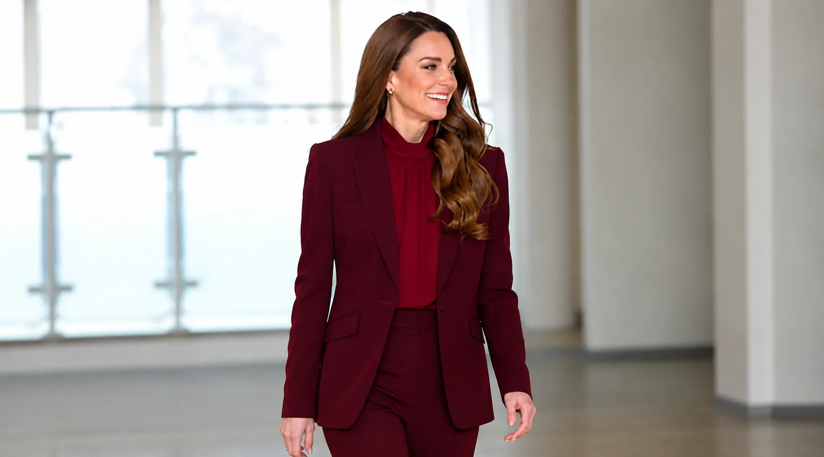 Kate Middleton-inspired Charing Cross Hospital burgundy blazer featuring a single-breasted front, notch lapels, structured shoulders, and a tailored slim-fit silhouette designed for a polished royal-inspired look.