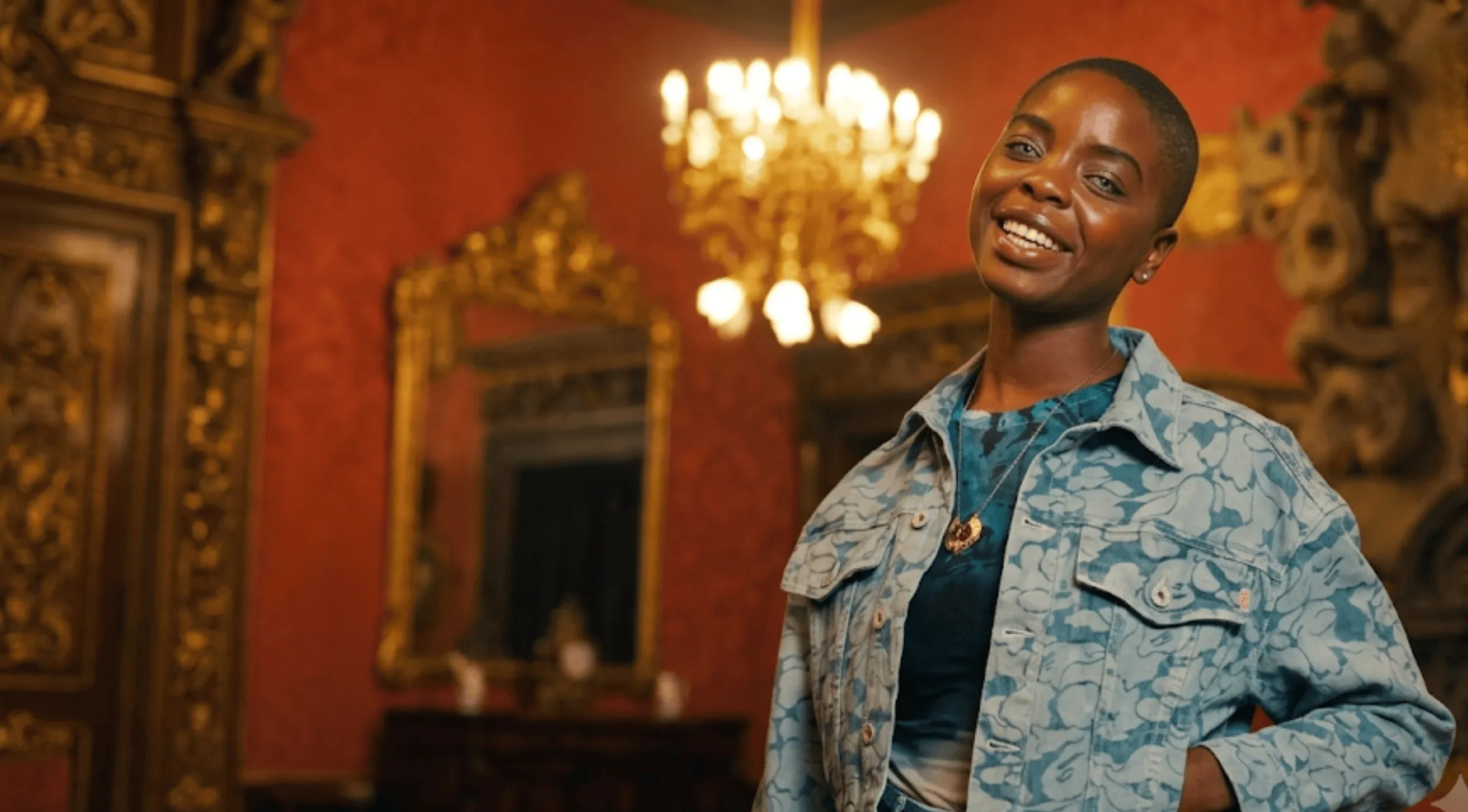 Joy Sunday as Bianca Barclay in Wednesday Season 2 wearing the light blue denim trucker jacket with an etched floral leaf pattern and front chest flap pockets.