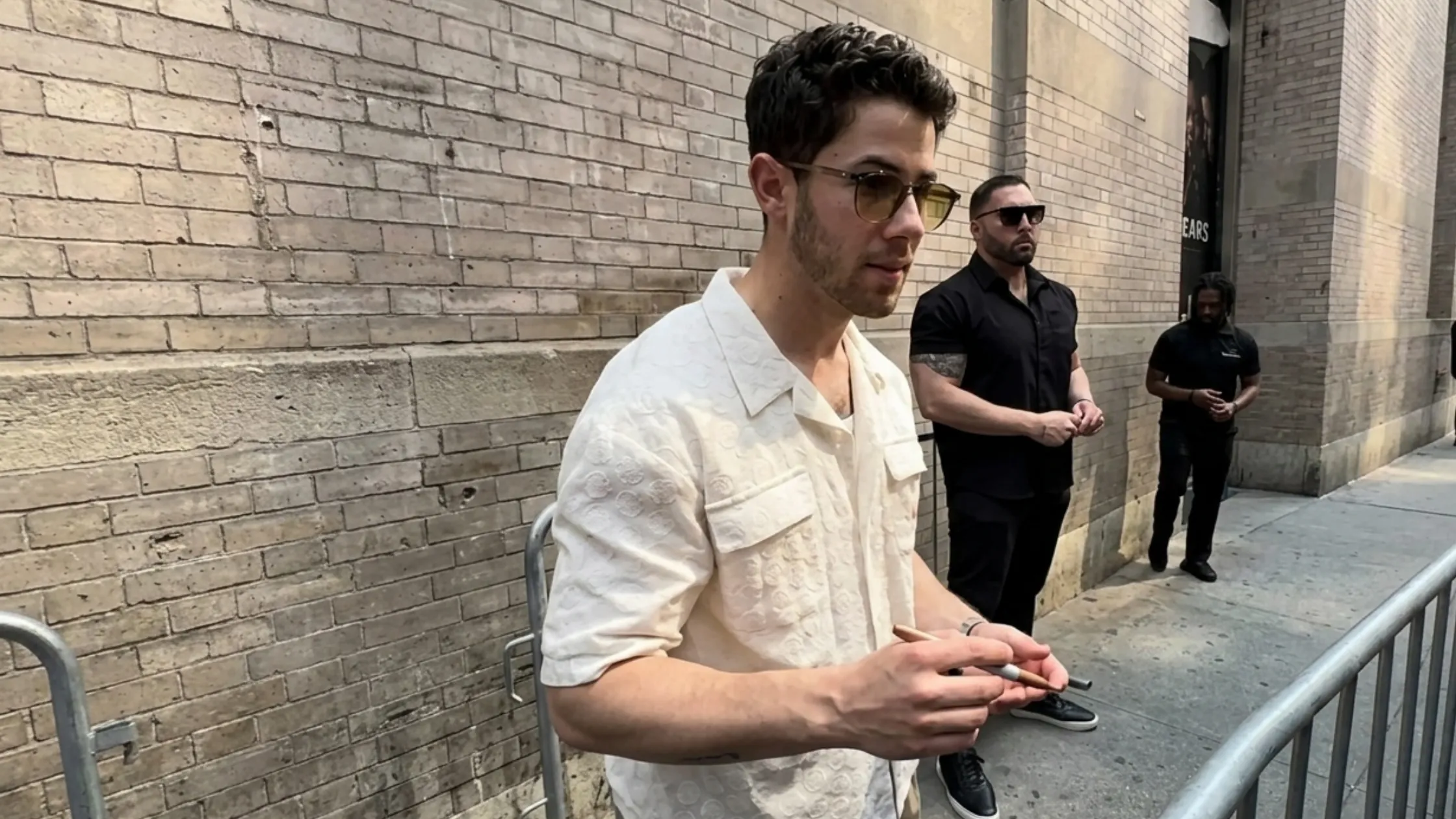 Nick Jonas cream shirt NYC