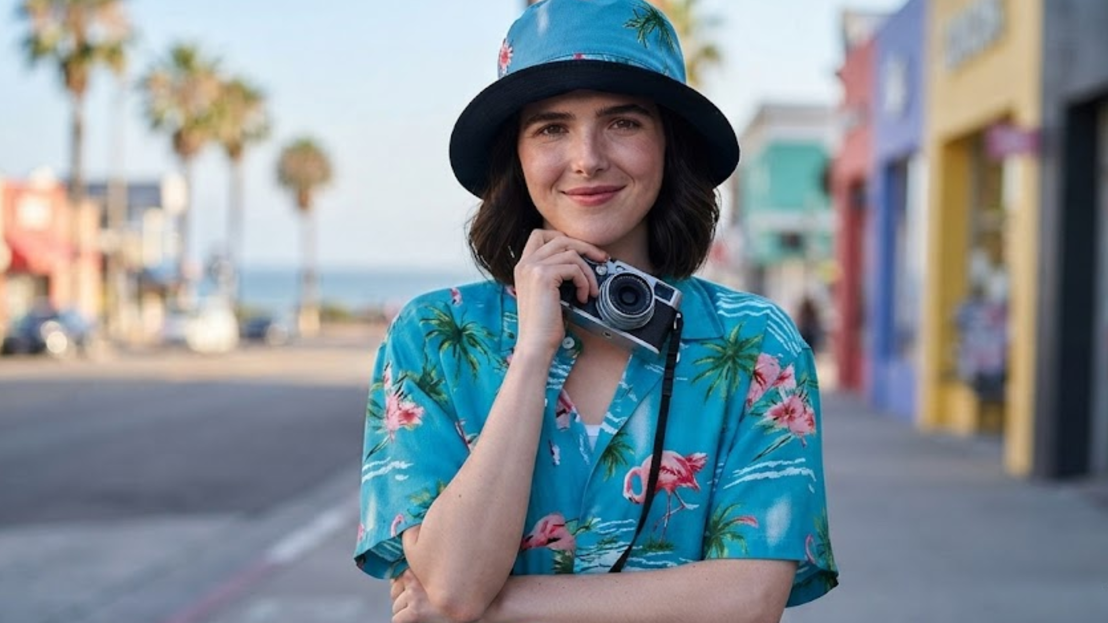 Voicemails for Isabelle Zoey Deutch blue Hawaiian shirt with flamingo tropical print, camp collar, and button-down design