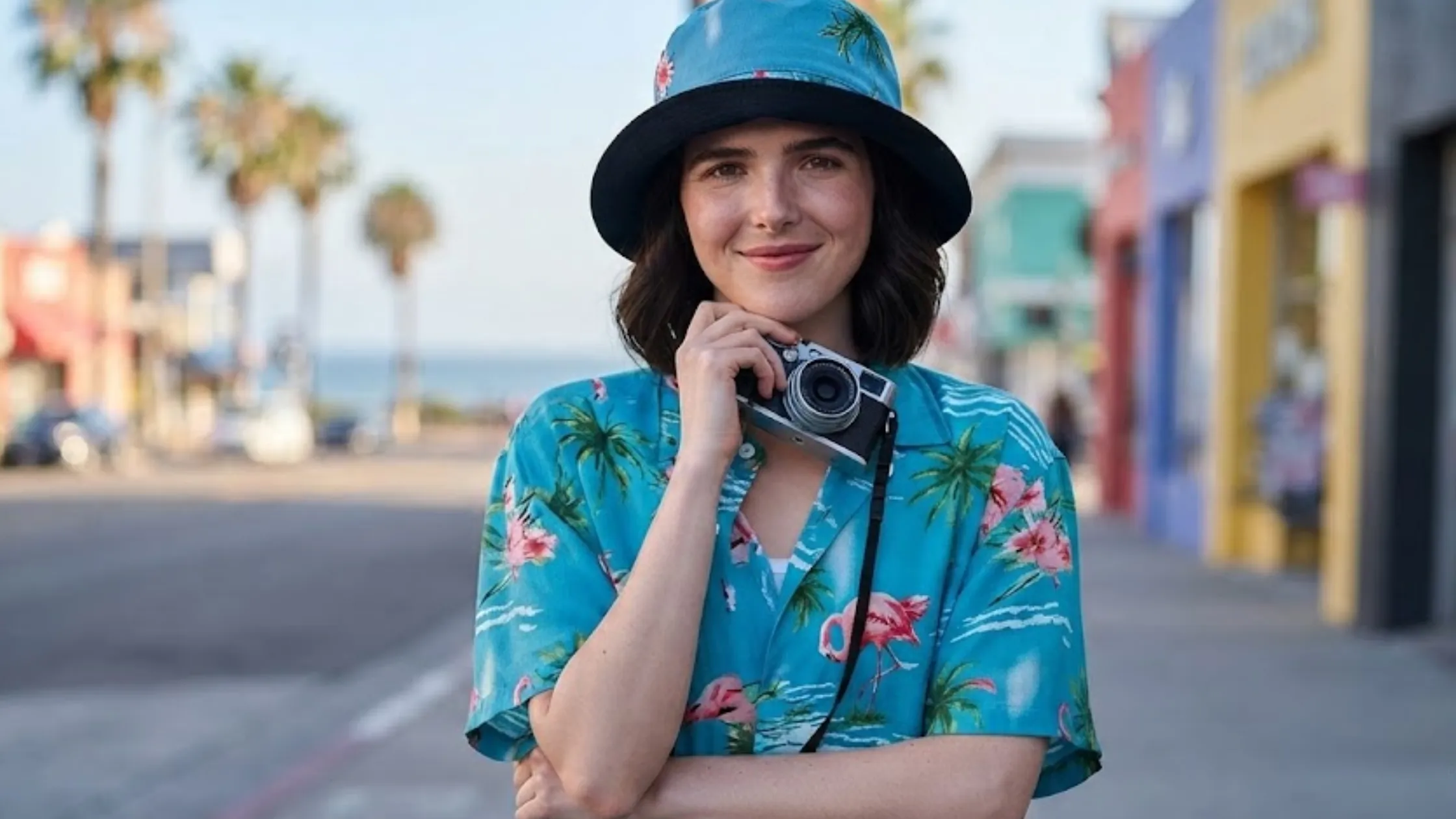 Voicemails for Isabelle Zoey Deutch blue Hawaiian shirt with flamingo tropical print, camp collar, and button-down design